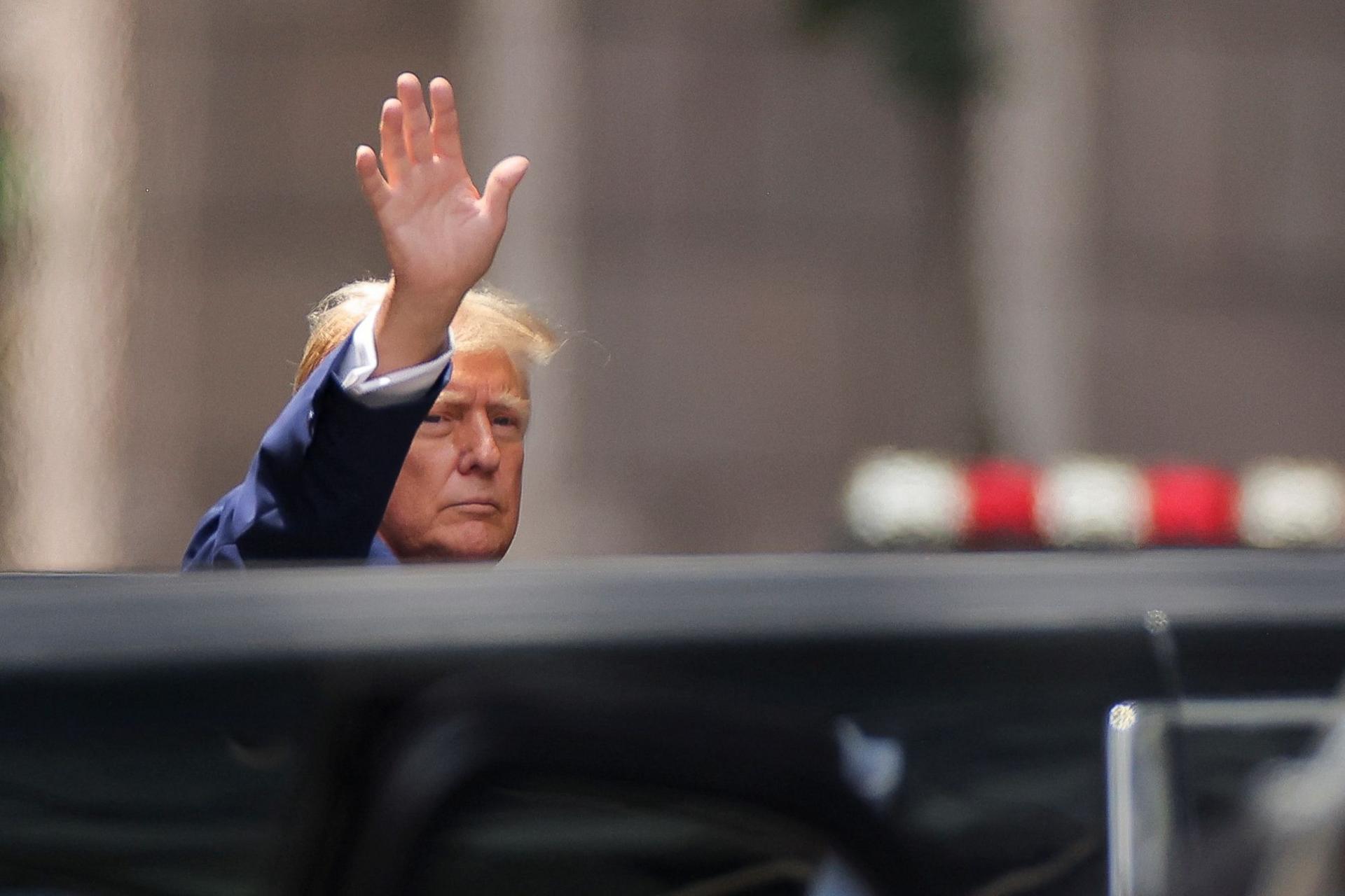 Donald Trump waving outside Trump Tower in New York City