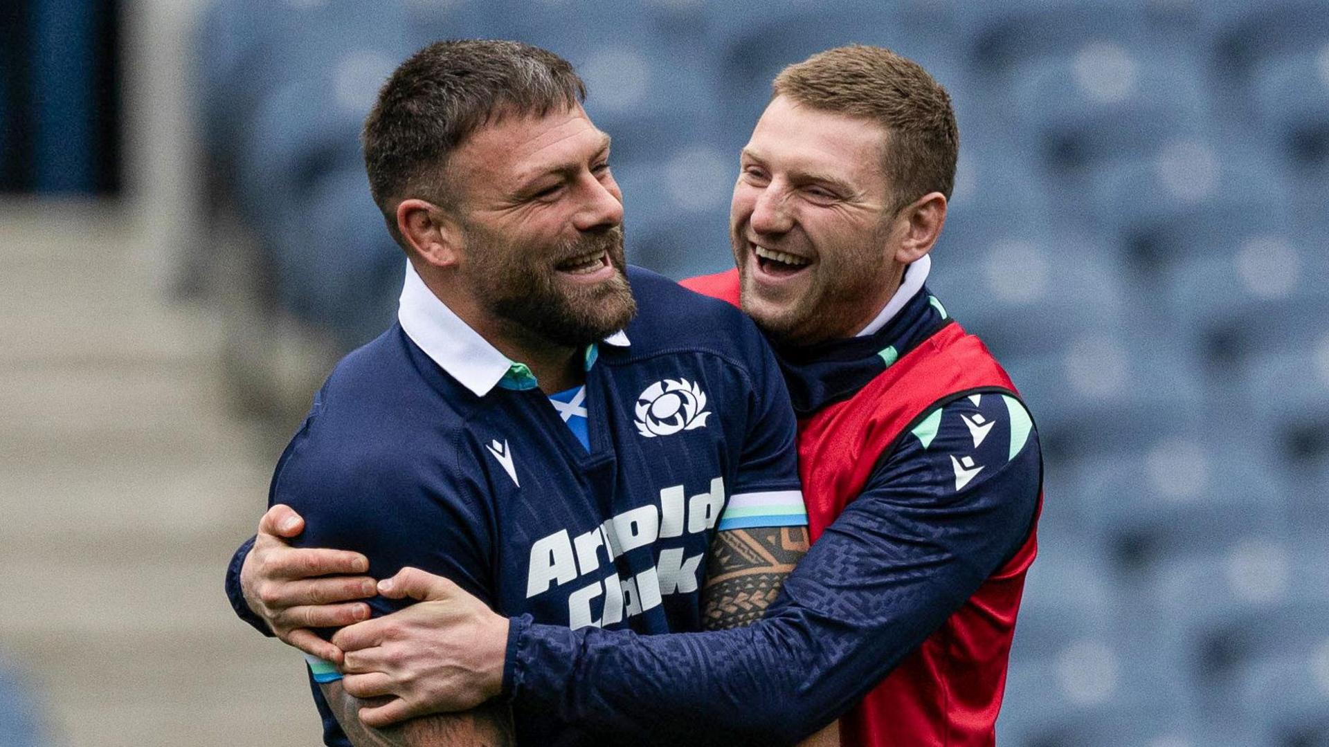 Rory Sutherland and Finn Russell smile in Scotland training