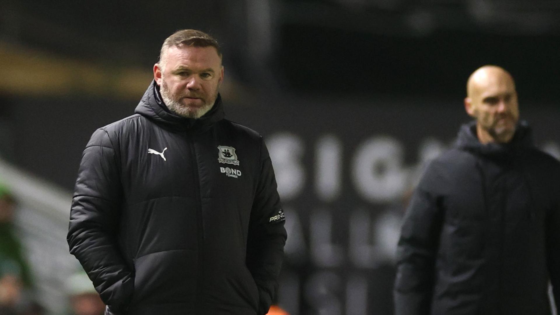 Manager Wayne Rooney looks disappointed during Plymouth's defeat to Swansea 