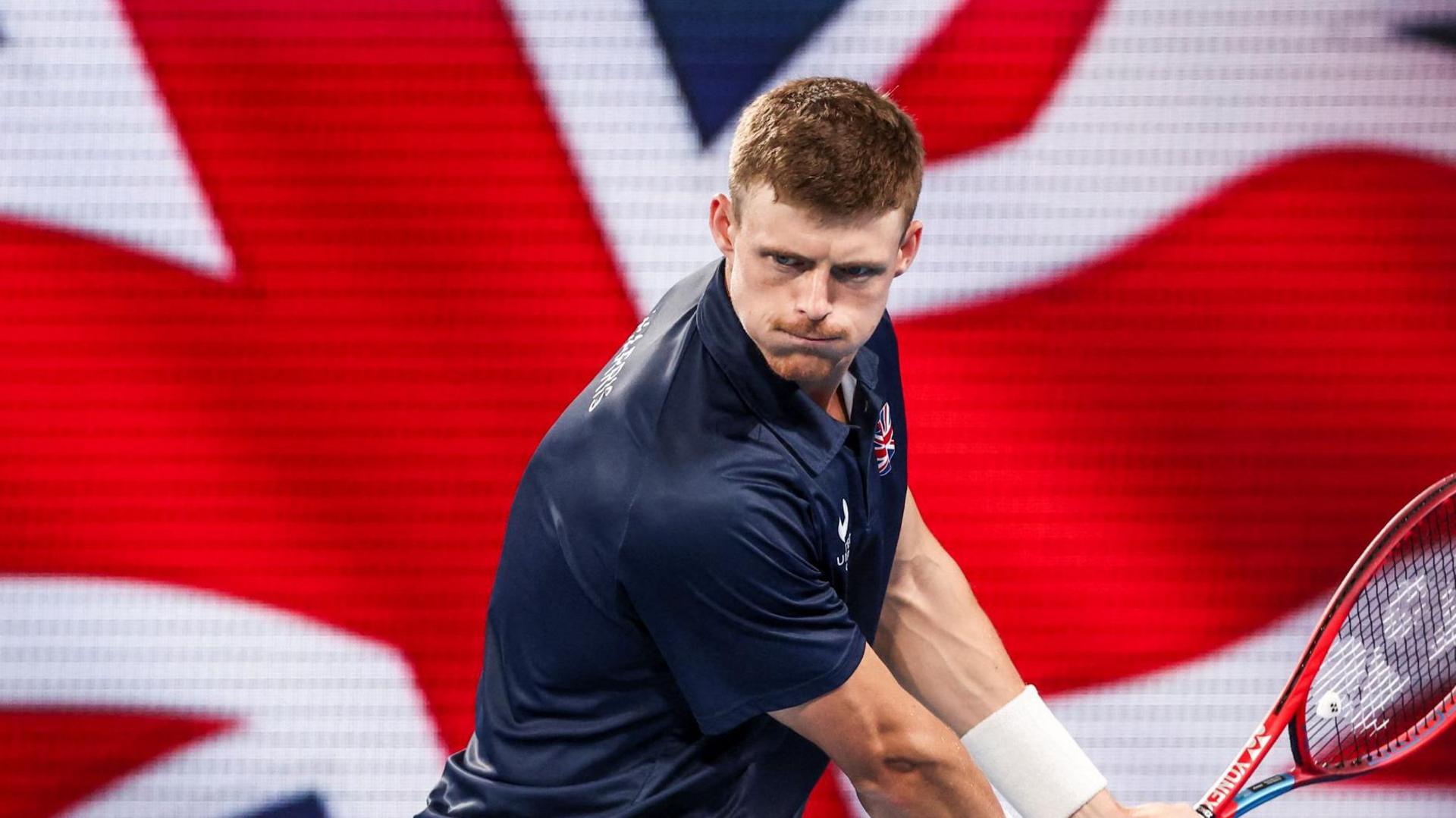 Billy Harris hits a backhand return during Great Britain's United Cup tie against Poland