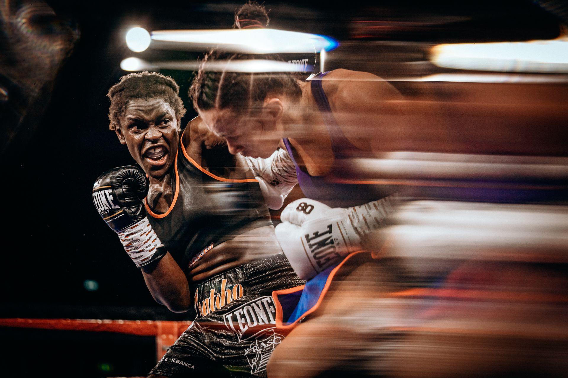 Italy's Pamela Malvina Noutcho Sawa en route to winning the European lightweight title by defeating Serb Nina Pavlovic on points