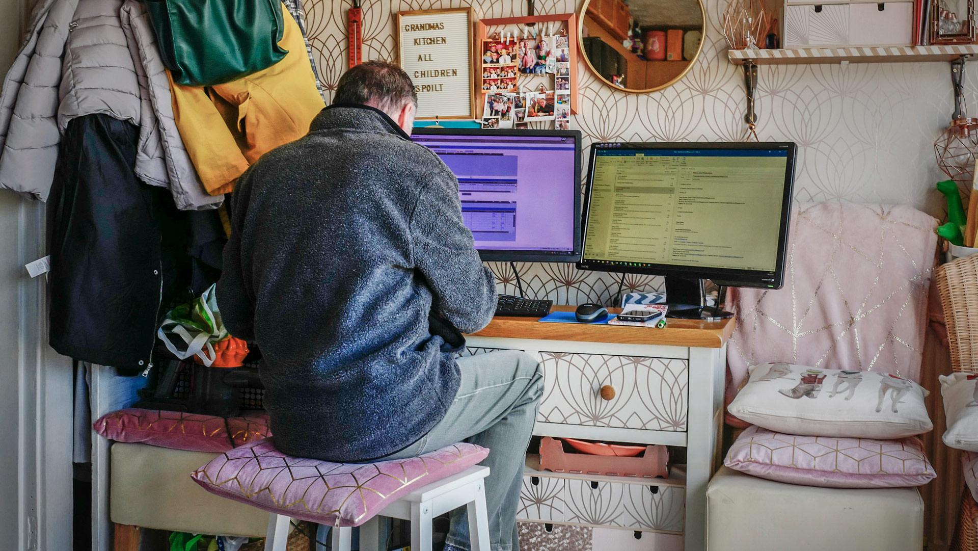 Man working at home at a makeshift desk