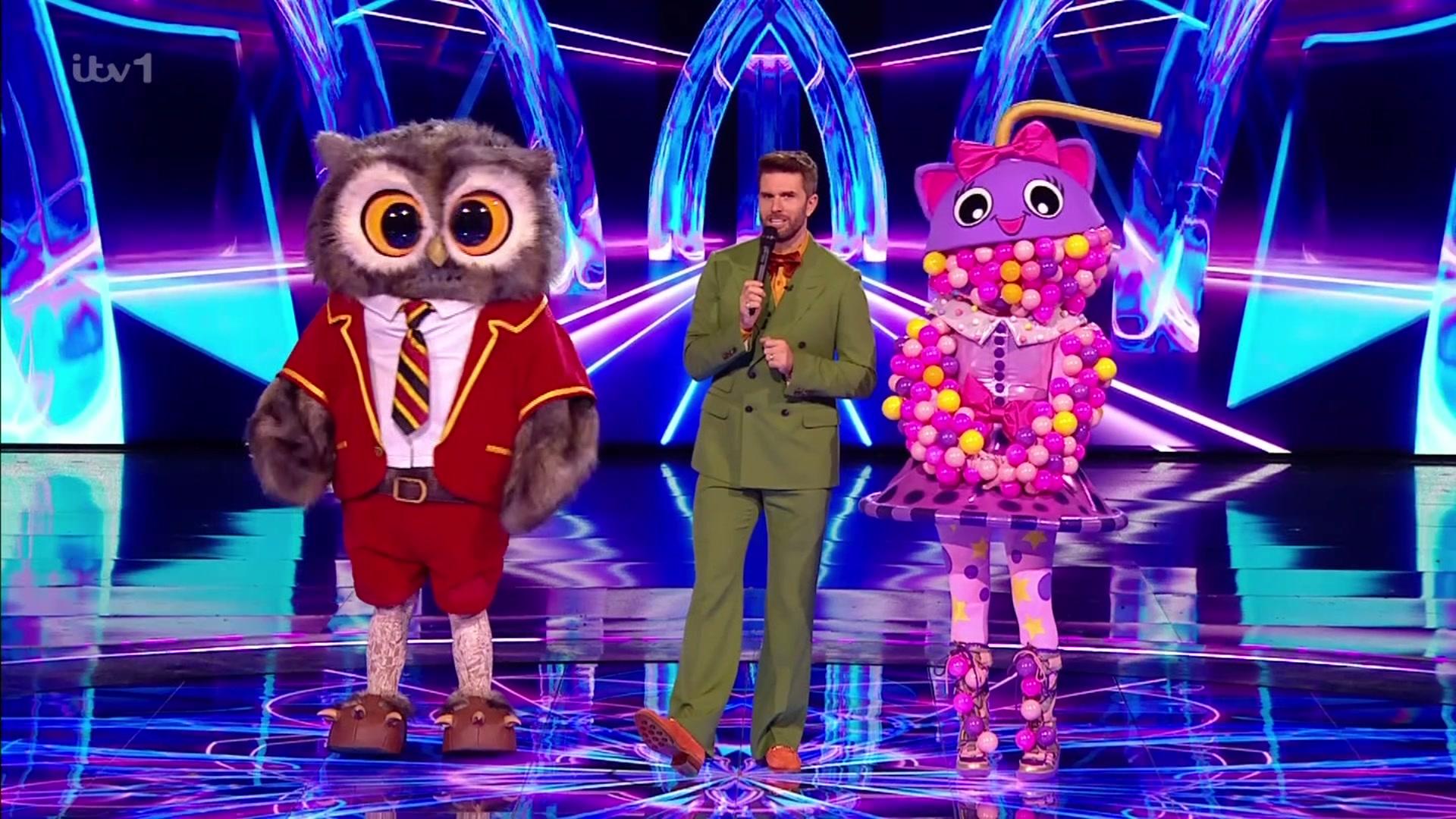 owl and bubble tea standing with host joel dommett