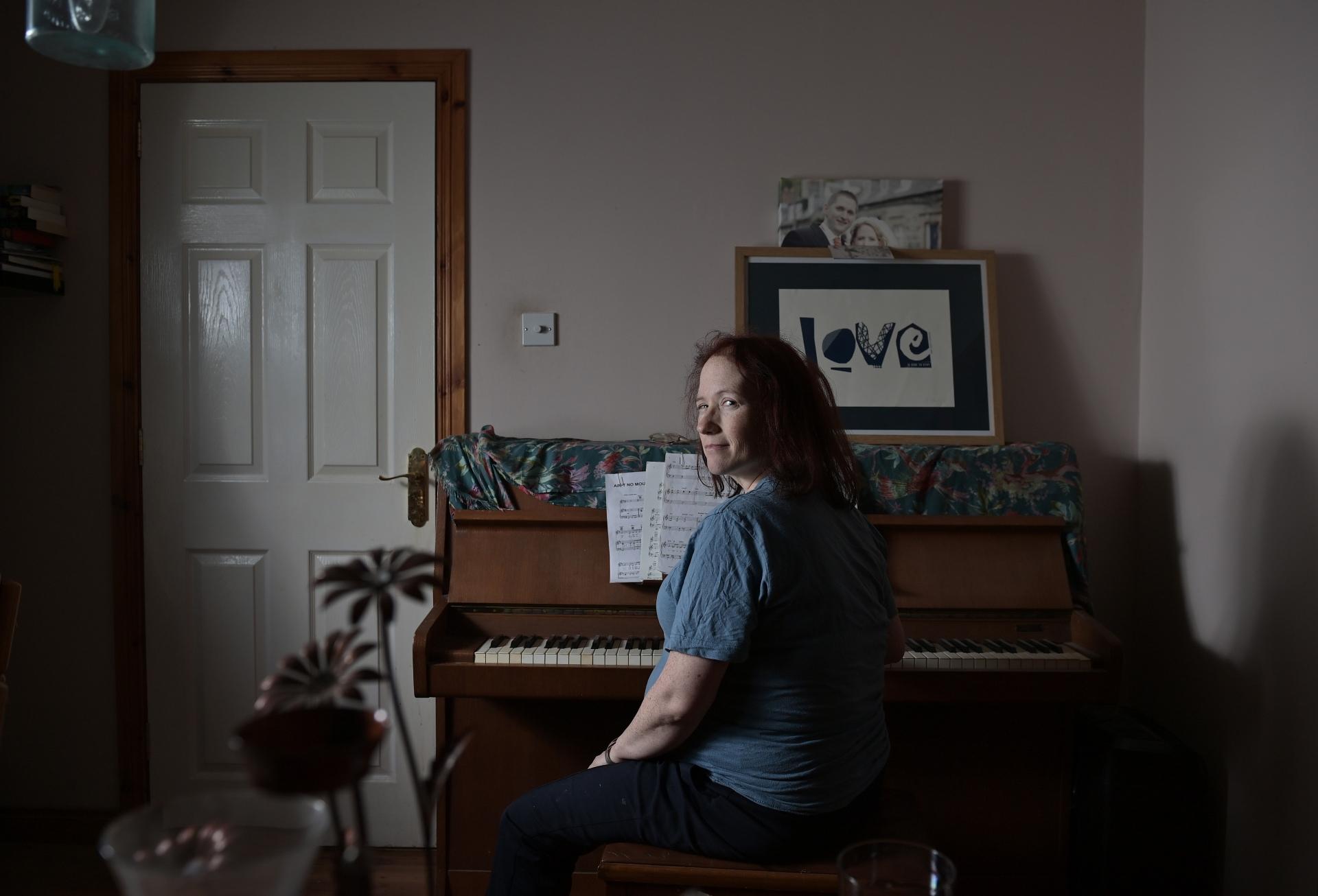 Heather at her mother-in-law's piano