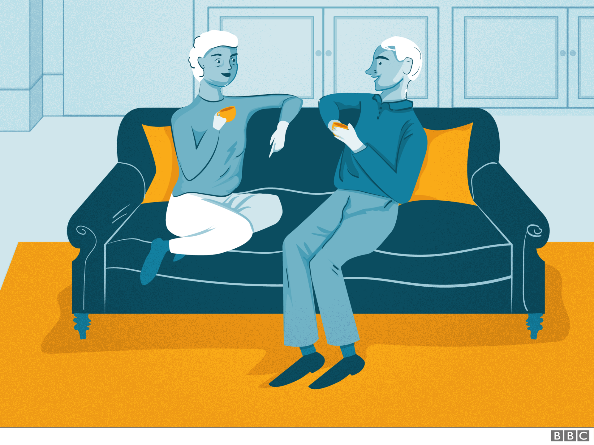 Older couple on a sofa chatting