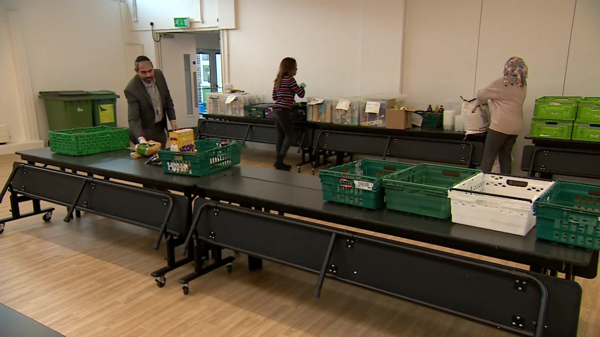 Teachers packing food parcels