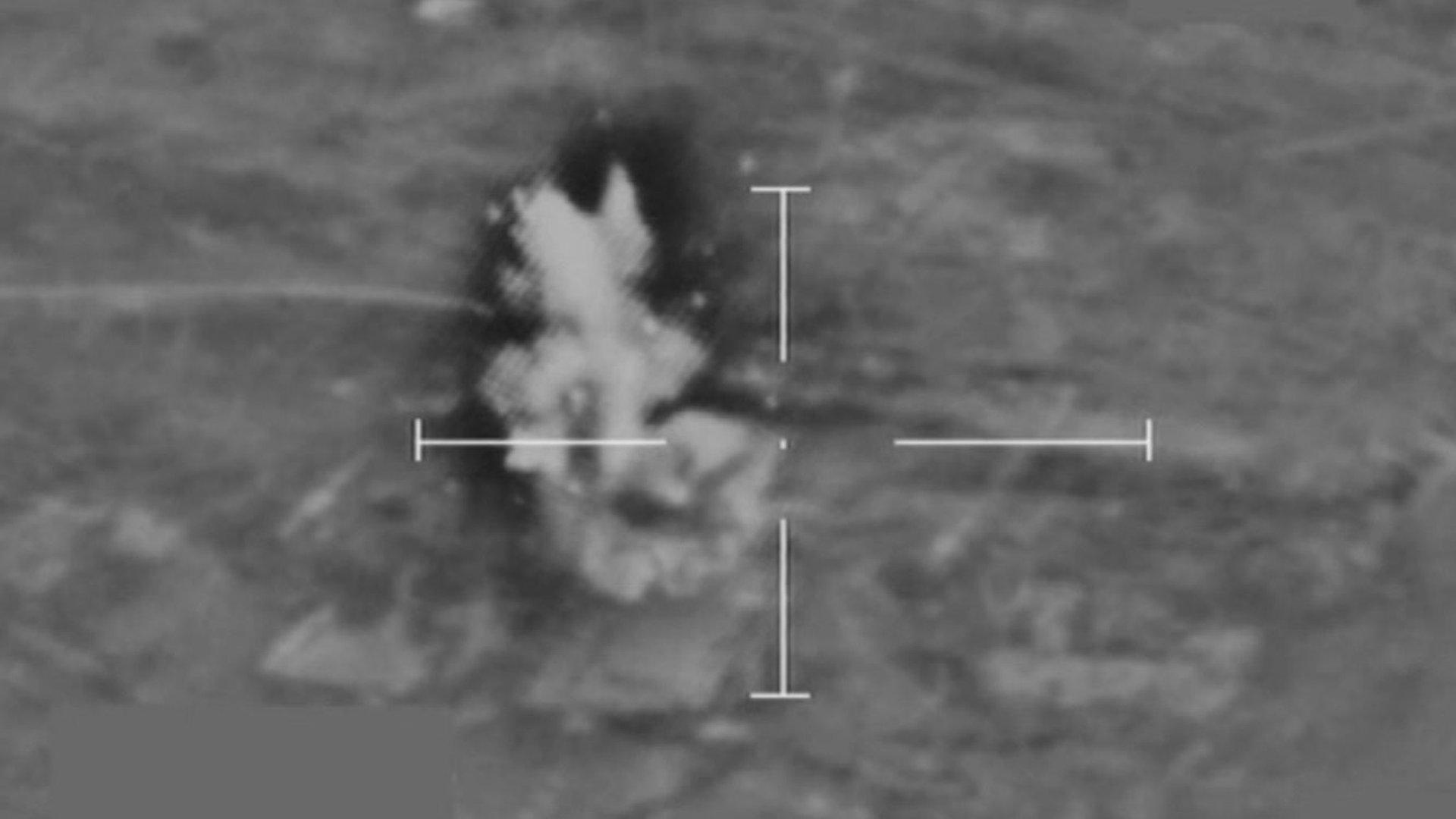 Still from footage of RAF bombing over Syria