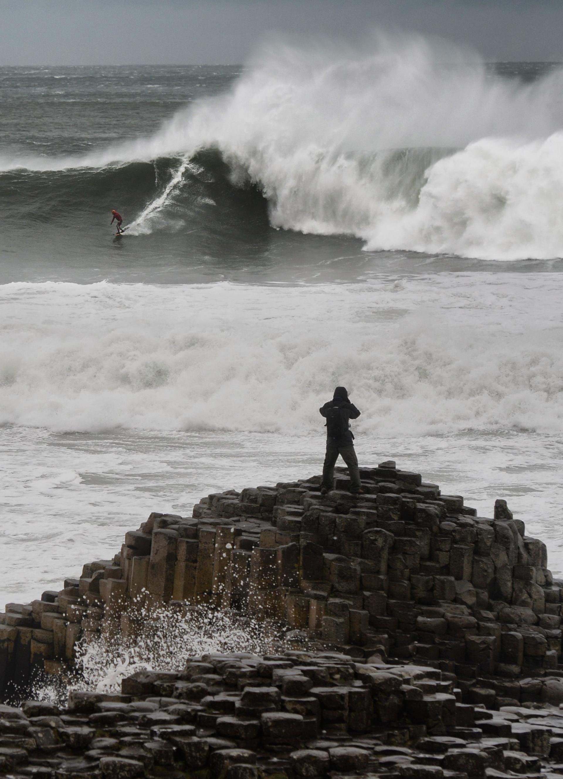 Al Mennie surfing off the Giant's Causeway