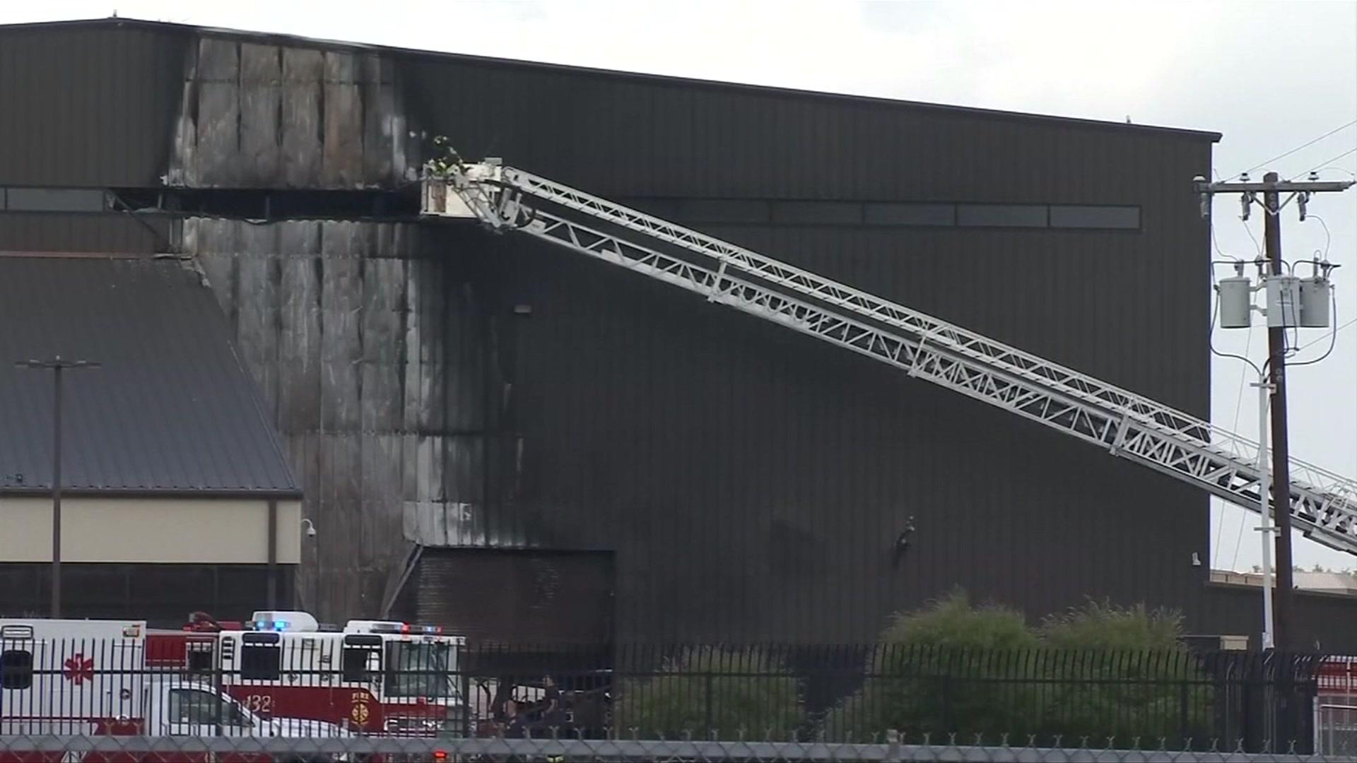 Emergency crew at the scene of a plane crash at Addison Airport, Texas