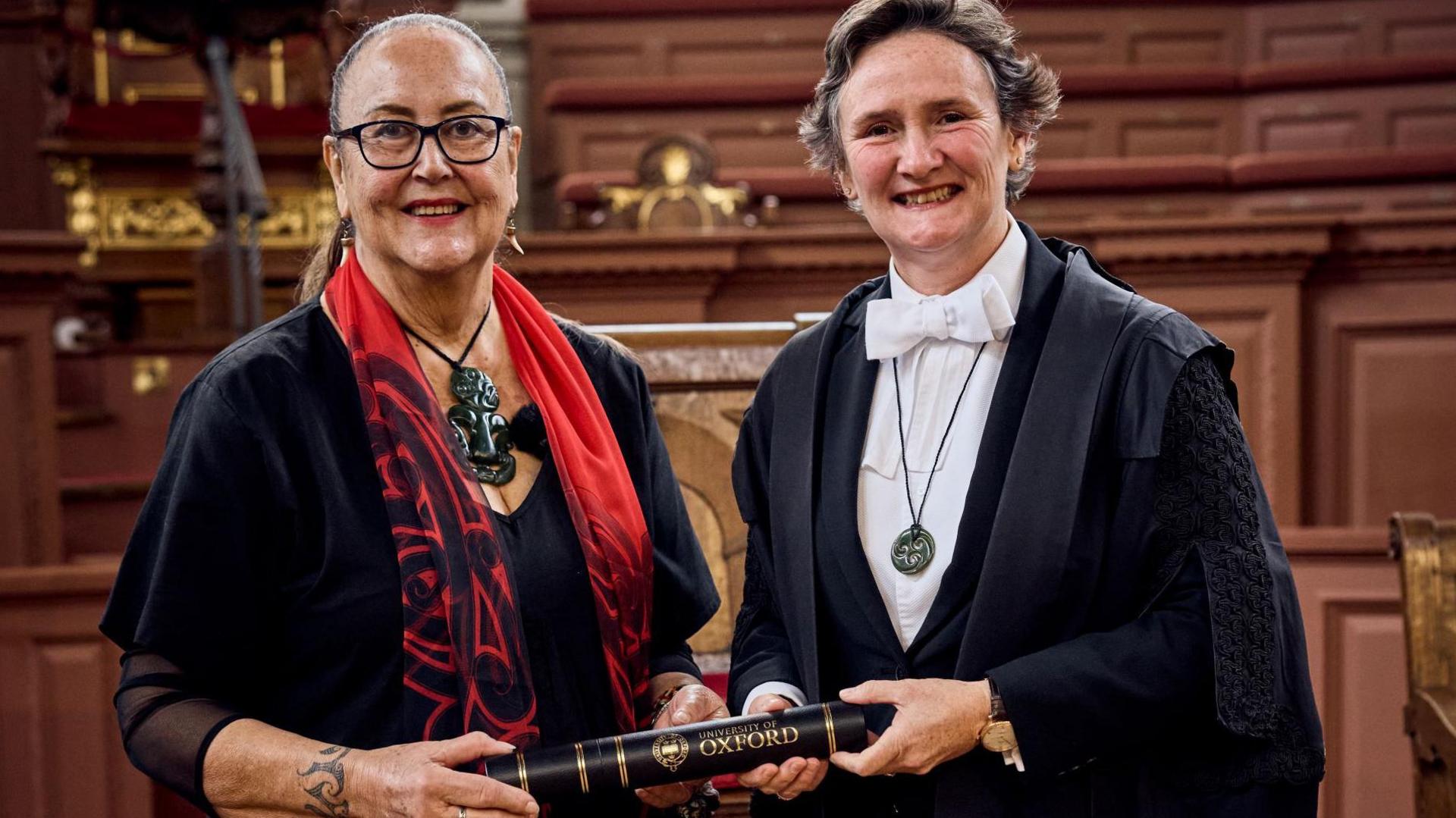 June Northcroft Grant one of Mākereti Papakura's relatives receiving the posthumous degree from Professor Irene Tracey, Vice Chancellor of the University of Oxford in the Sheldonian Theatre, Oxford.