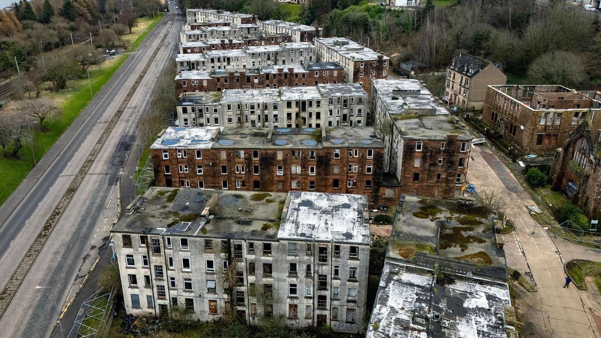 A drone shot of a derelict housing estate