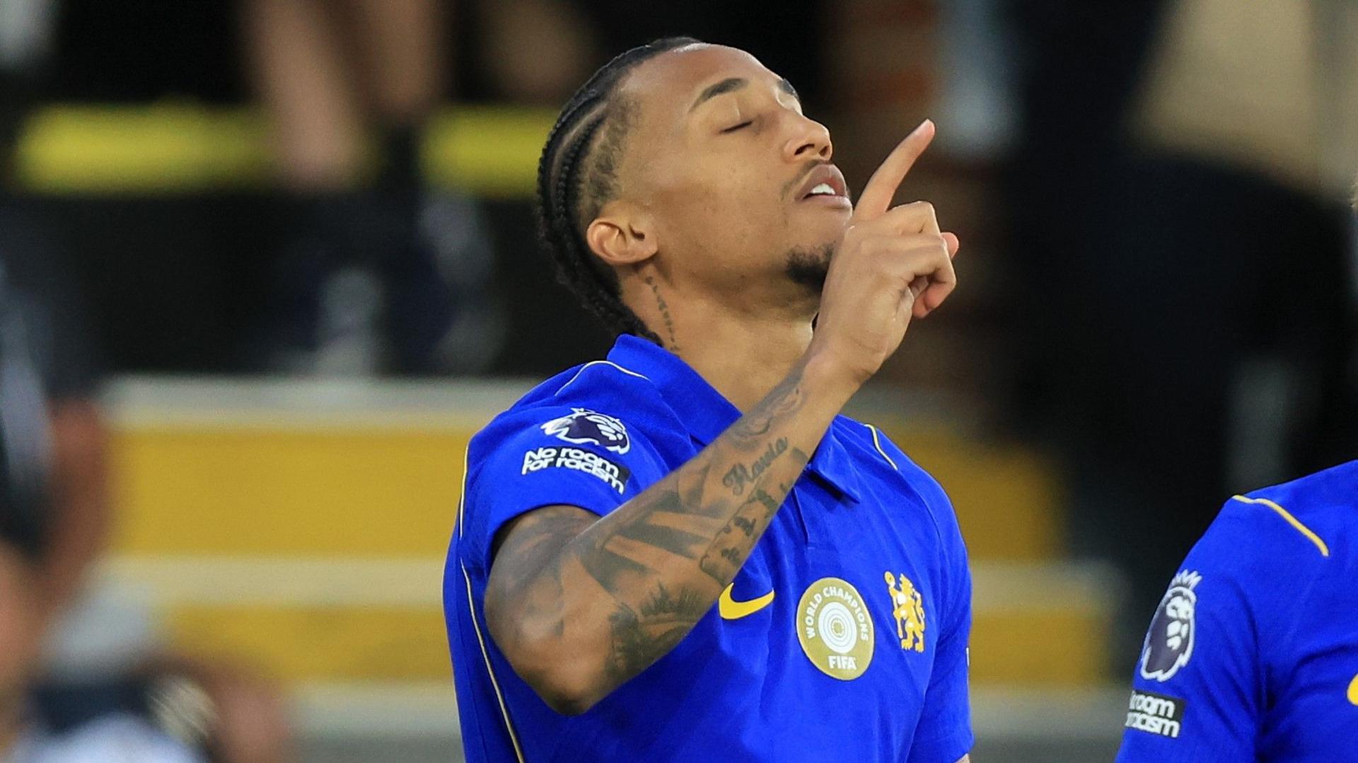 Joao Pedro celebrates scoring a goal