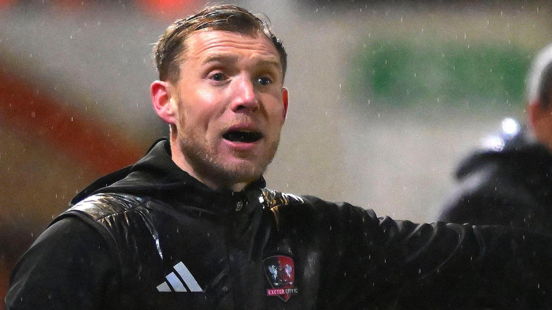 Dan Green shouts instructions from the touchline