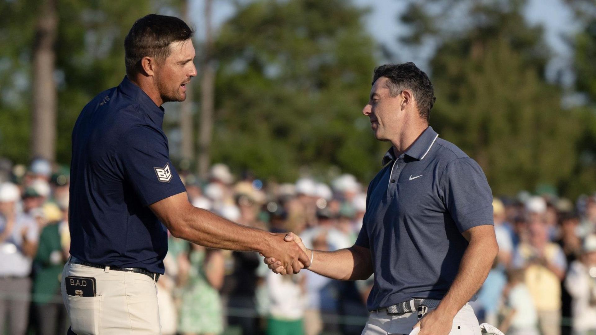 Bryson DeChambeau and Rory McIlroy shake hands at the end of the Masters final round