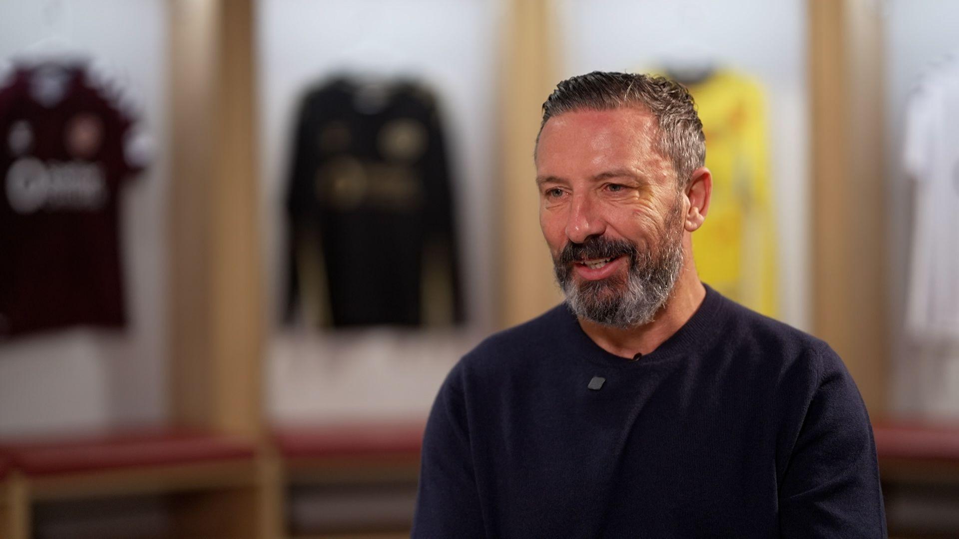 Hearts manager Derek McInnes smiling as he talks to BBC Sport in the Hearts home dressing room at Tynecastle 