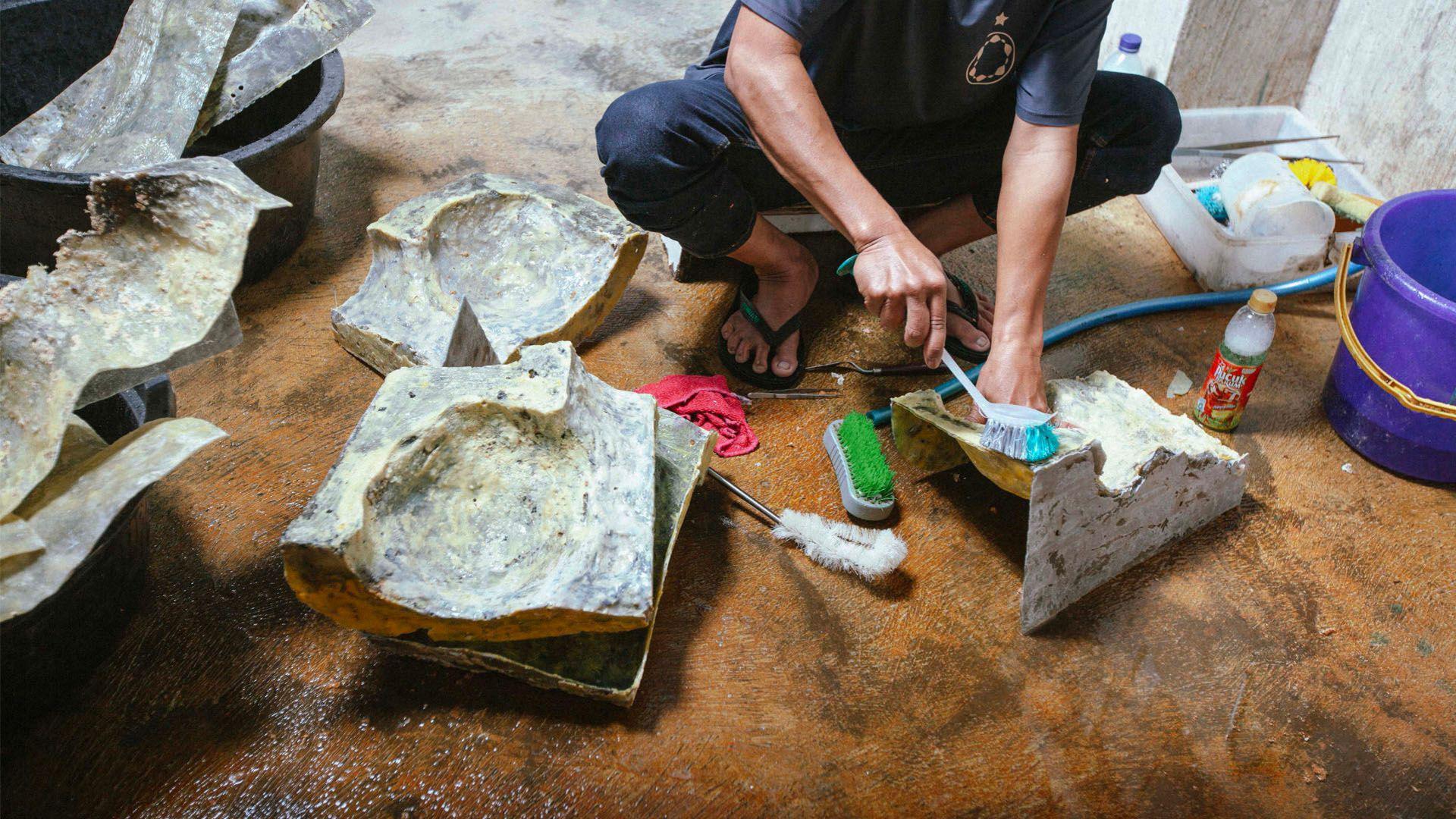 Palm oil shells being cleaned