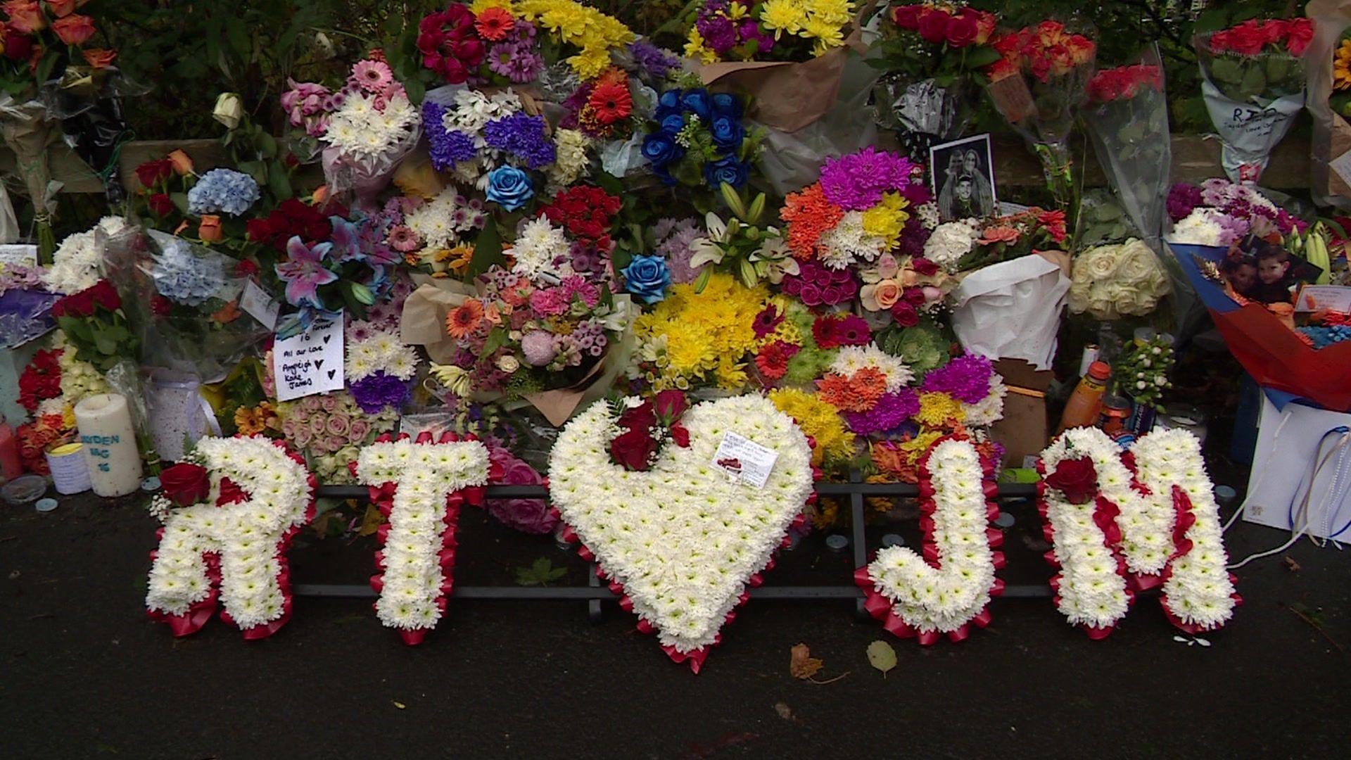 Floral tributes left at the scene of the crash.