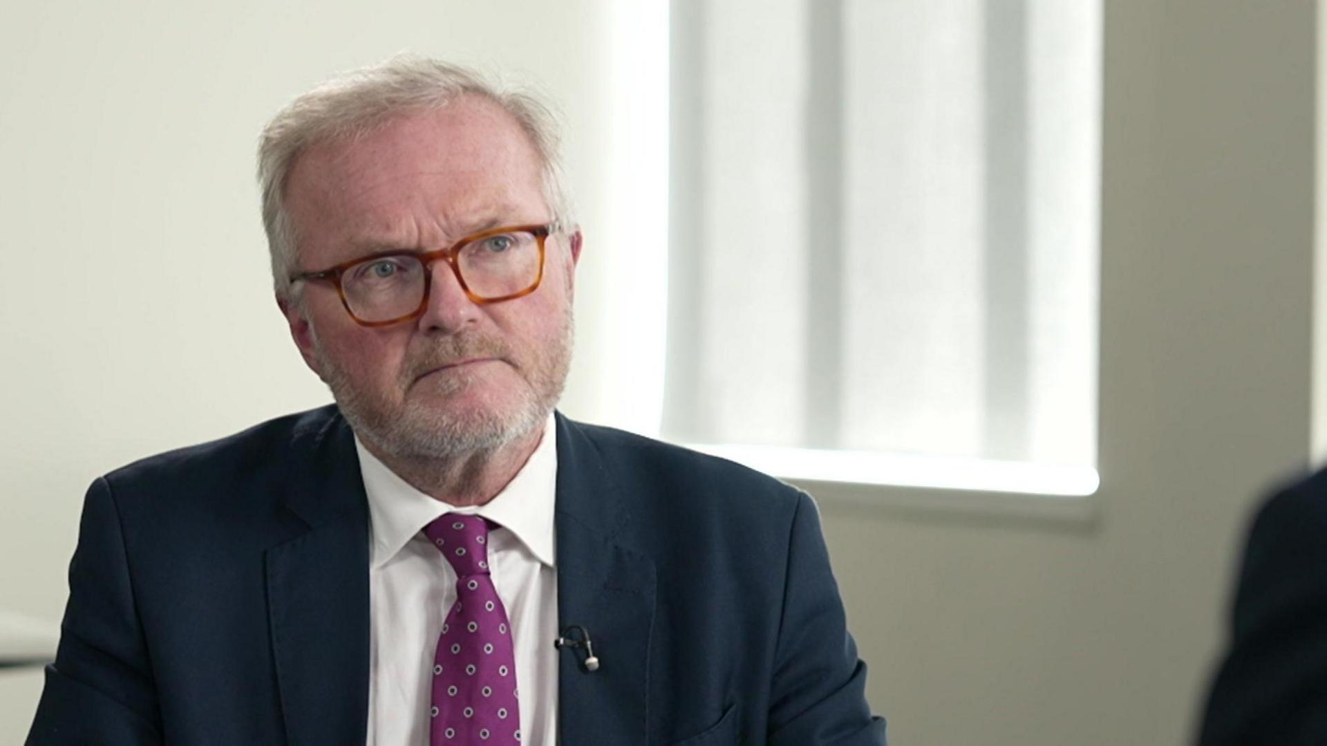 BBC South's political editor Peter Henley sat down for an interview in a room looking away from the camera, towards Ed Davey.