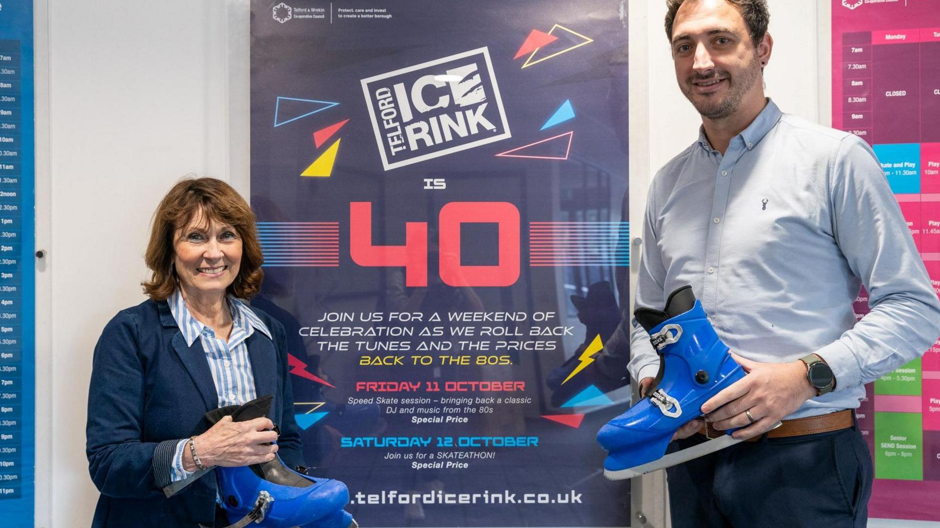 Angela McClements, of the council with rink team leader Mark Gray, hold blue ice skates in front of a poster promoting the weekend of celebration that will "roll the tunes and the prices back to the 80s"