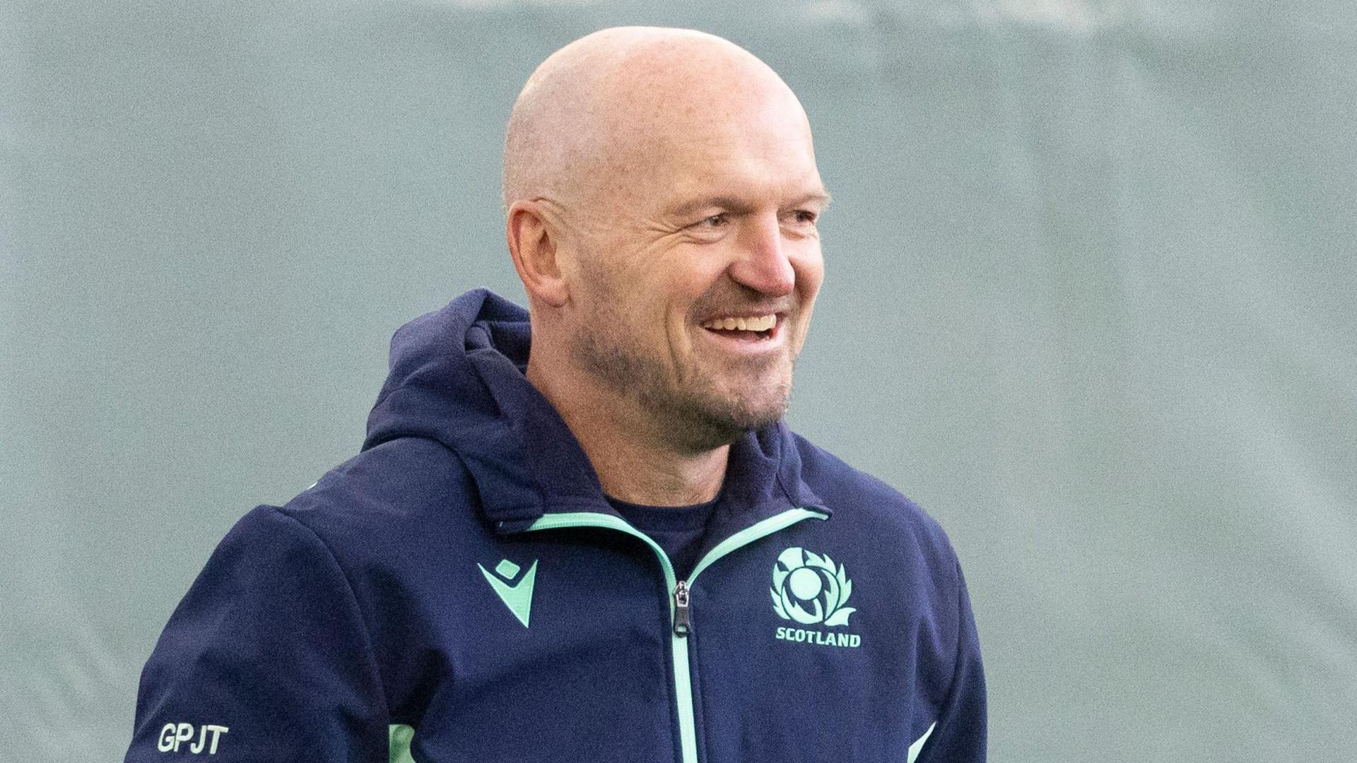 Gregor Townsend smiles in Scotland training