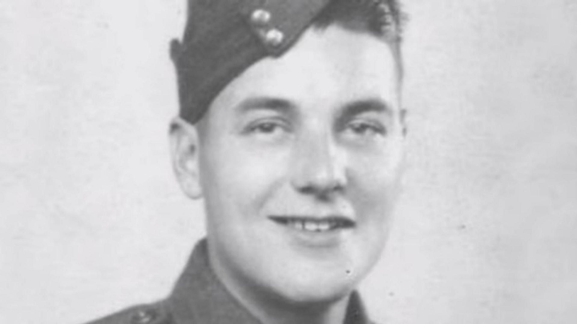 An old black and white photo of Sapper George Onions in uniform.
