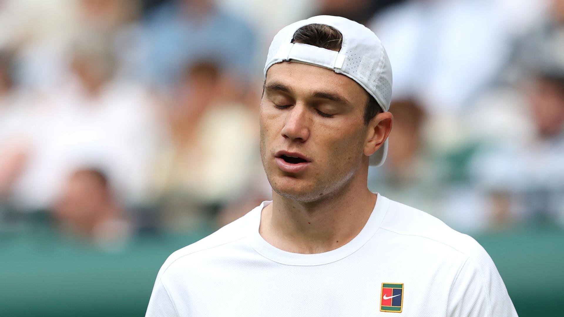 Jack Draper winces during his Wimbledon defeat by Marin Cilic