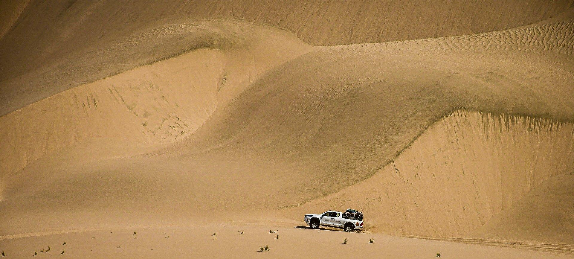 A pick-up truck in the desert