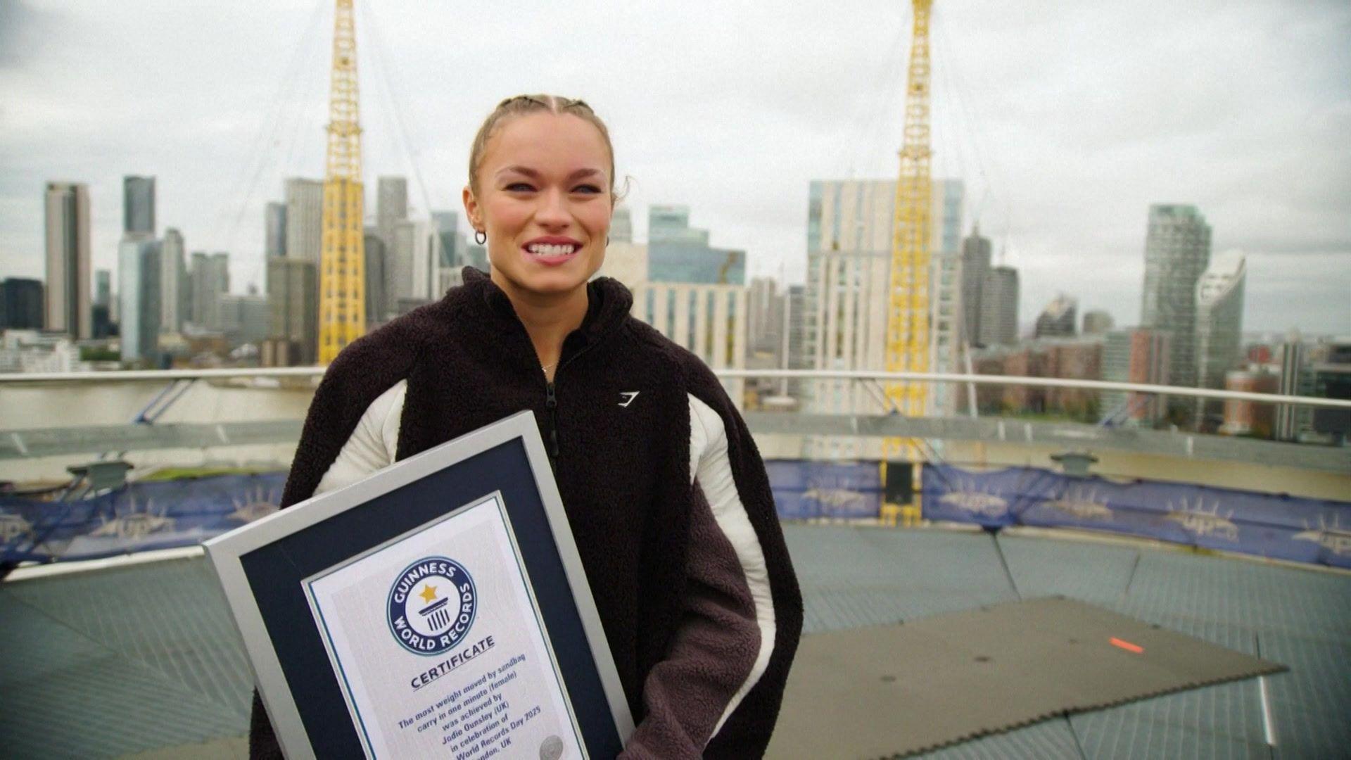 Fury holding world record certificate
