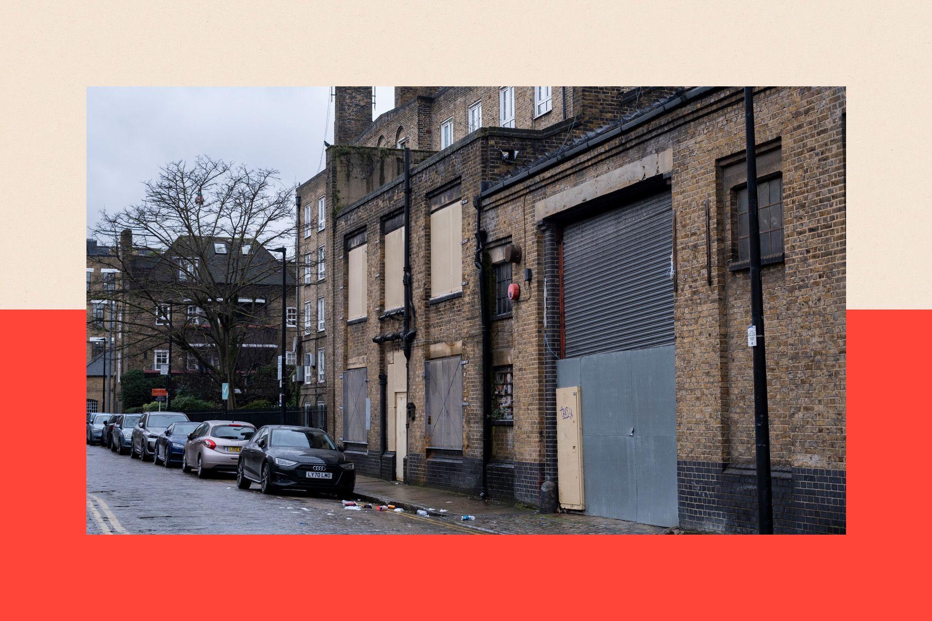 Boarded up closed down premises in Wapping in the East End 