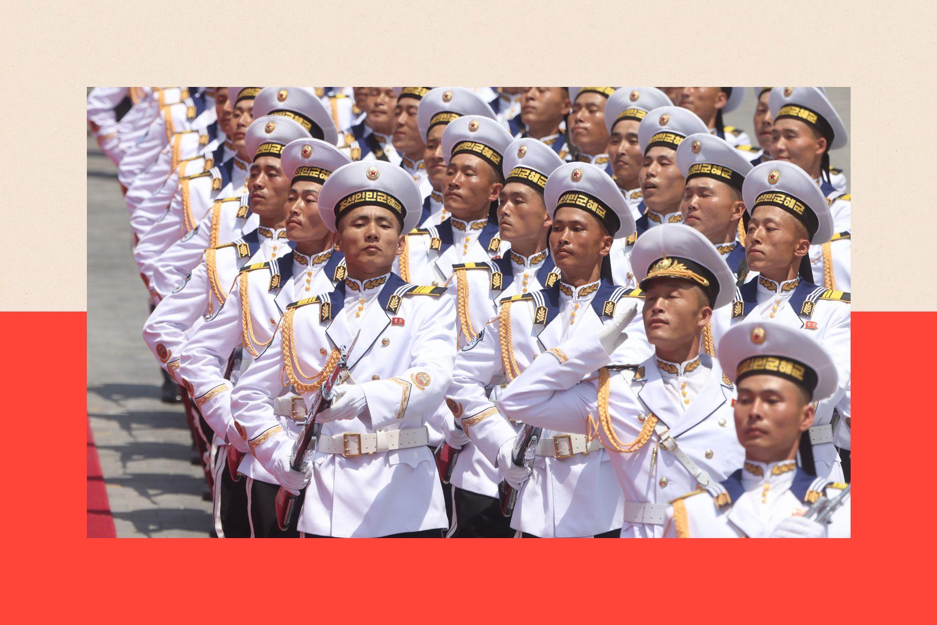 North Korean Navy's military officers march during a welcoming ceremony, 
