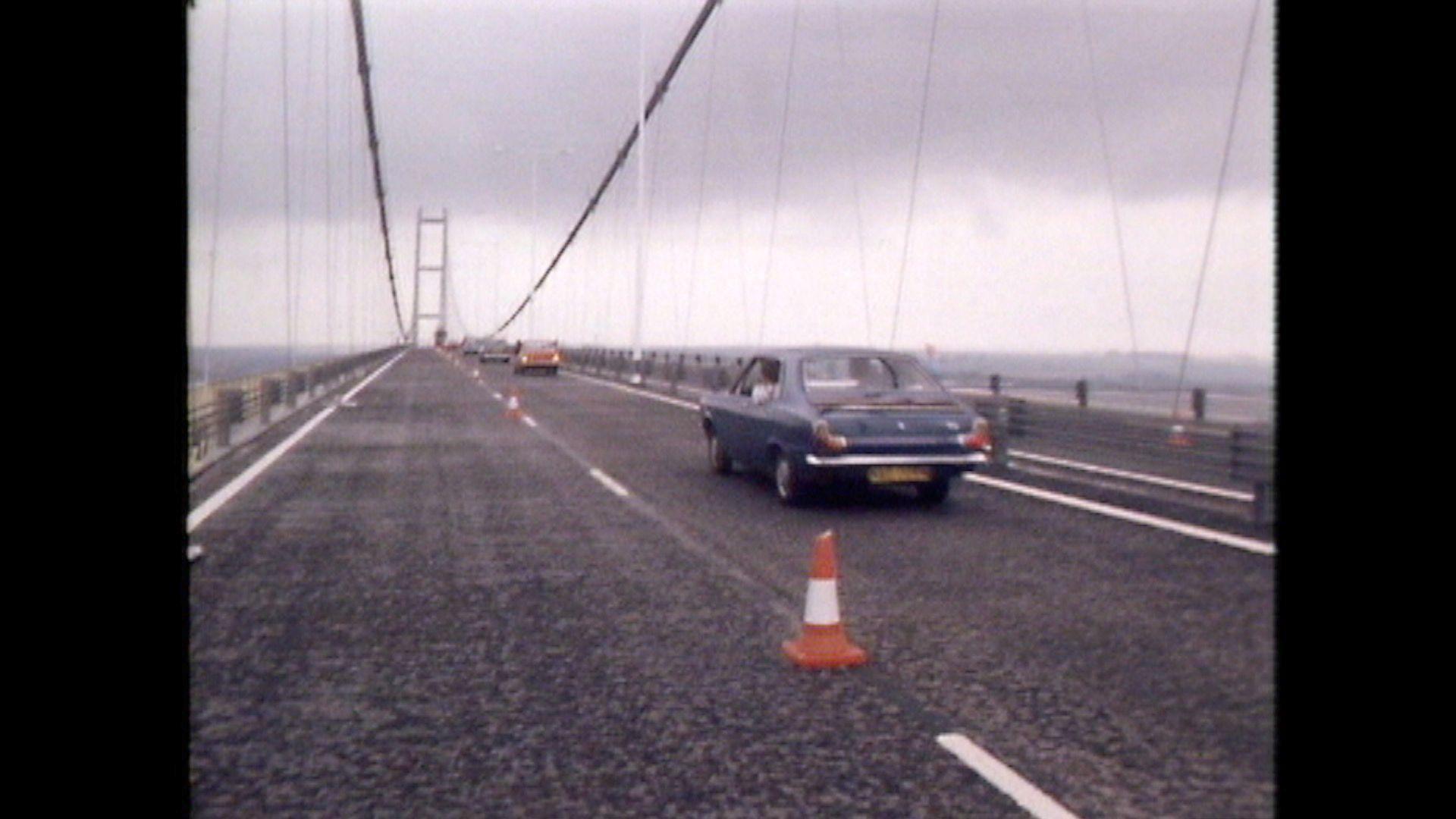 A single line of cars crossing the Humber Bridge.