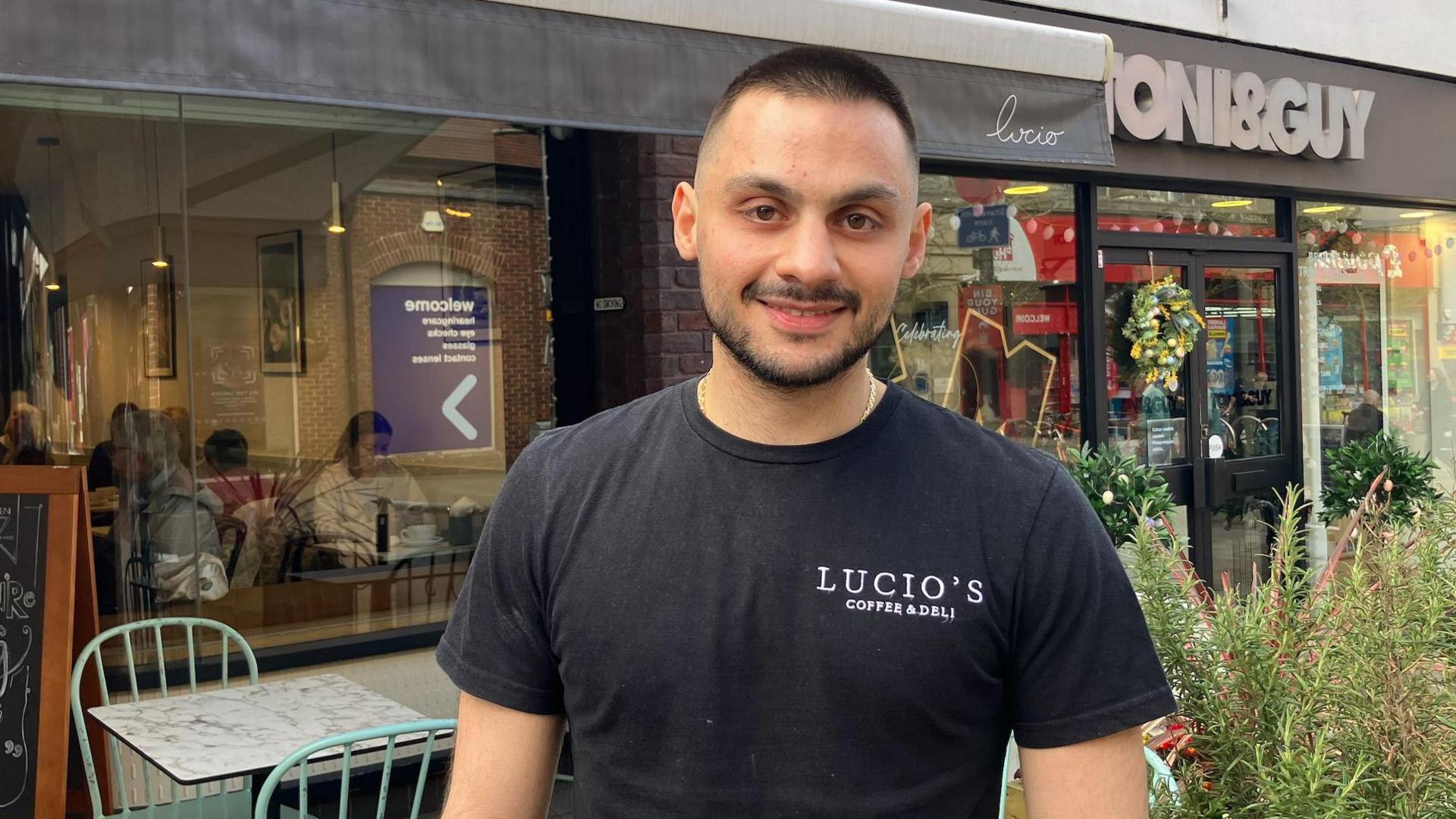 Lucio Dilena, the owner of Lucio's Coffee & Deli in Leatherhead, pictured outside his shop.