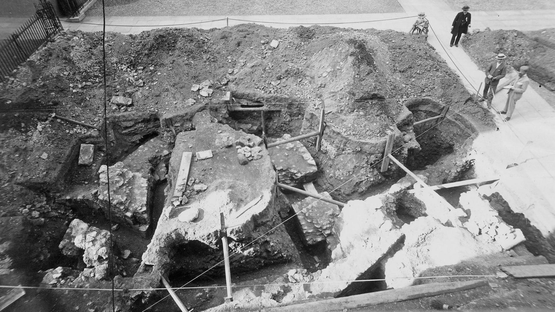 Another angle of the Victorian dig. The site is supported by wooden planks and poles.