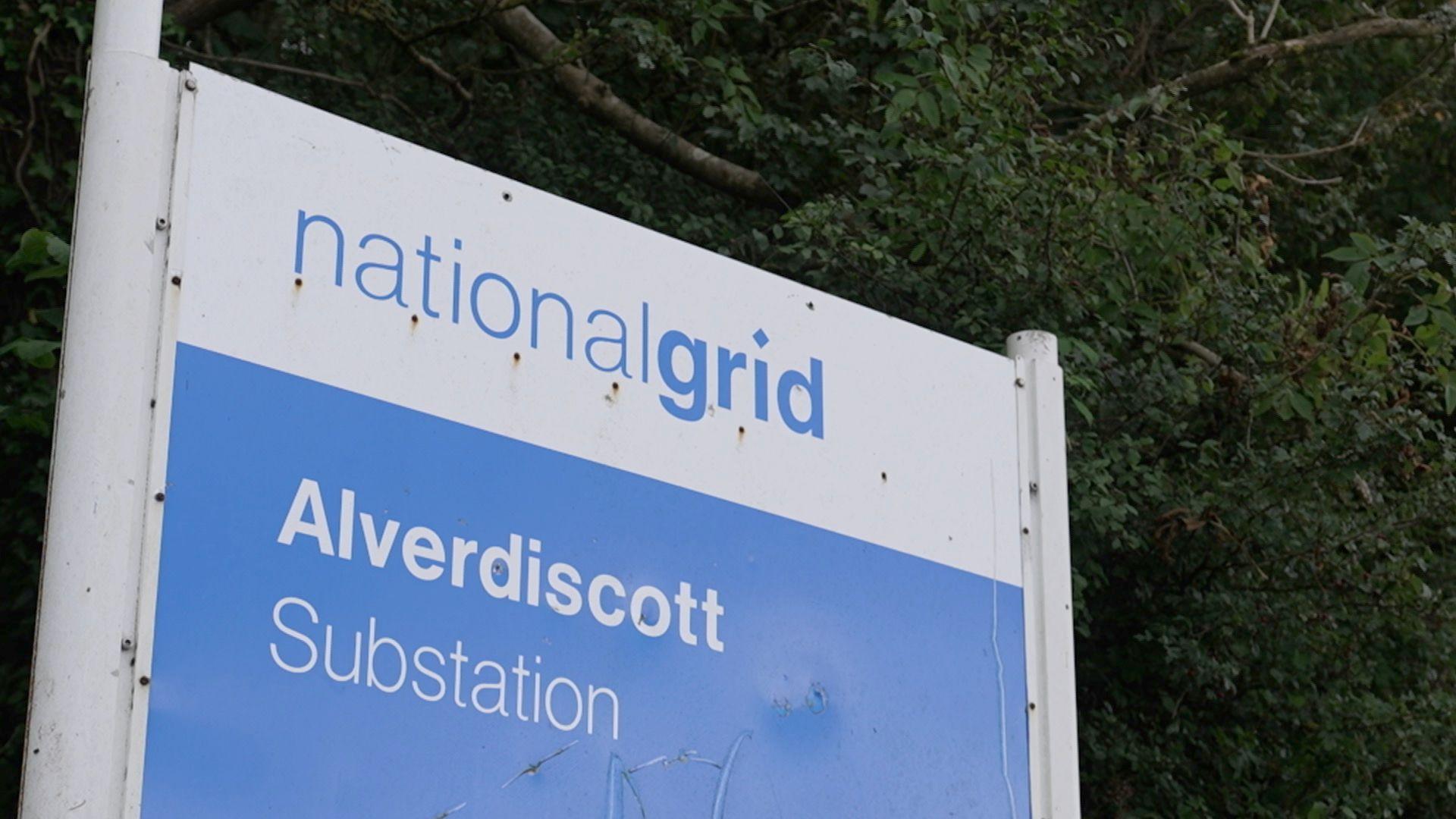 An image of a National Grid sign that reads Alverdiscott Substation.  The signage is blue and white. 