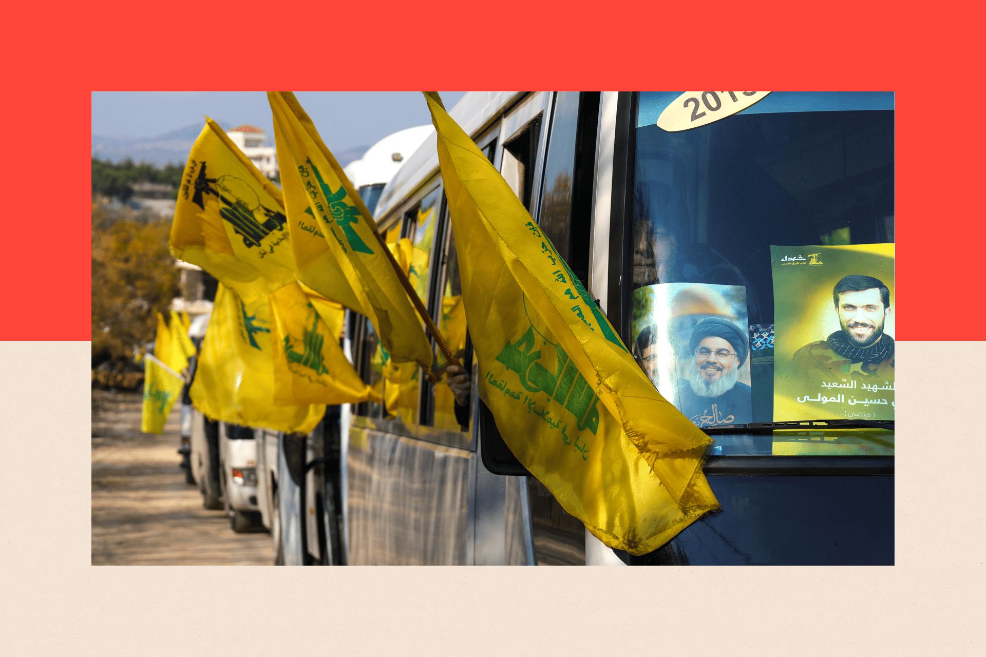 Residents riding on buses hold flags and display pictures of slain Hezbollah leader Hassan Nasrallah 