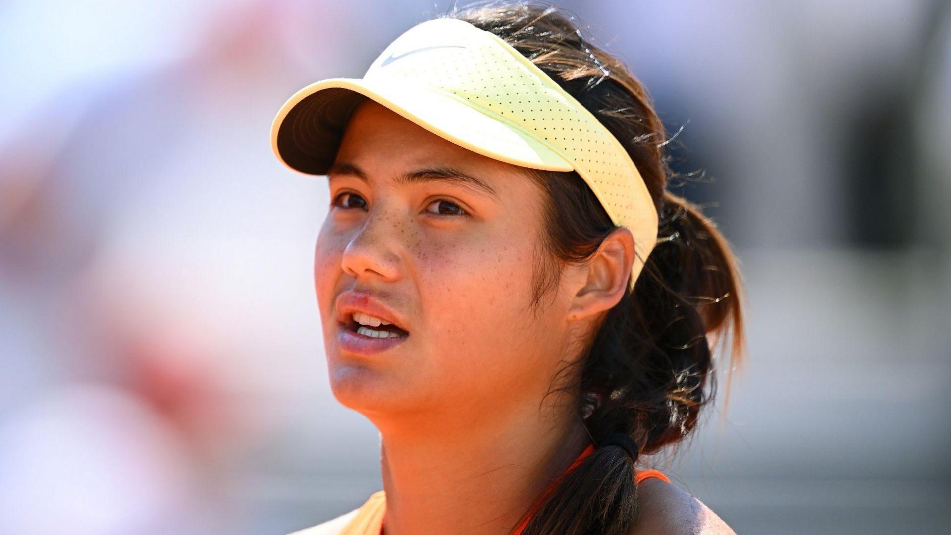 Emma Raducanu reacts to losing a point during a match