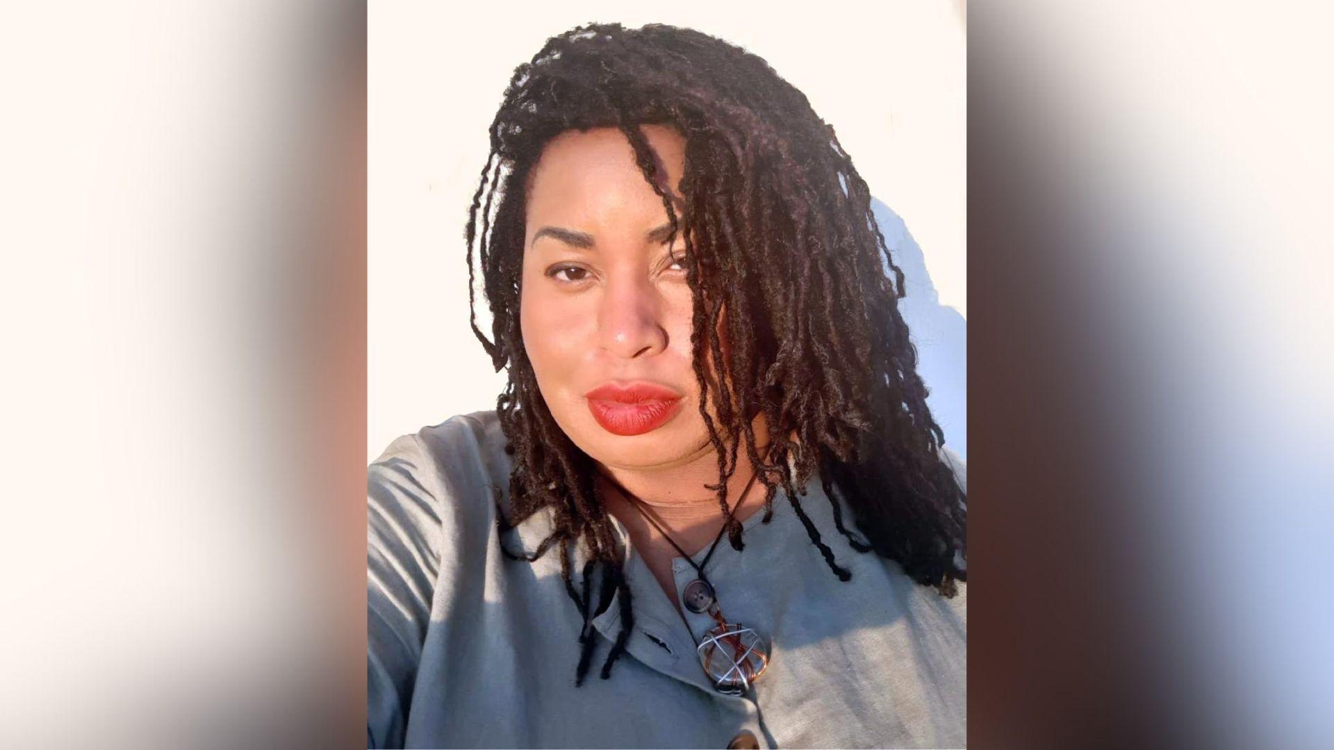 Selfie of Honey Williams in front of a white background