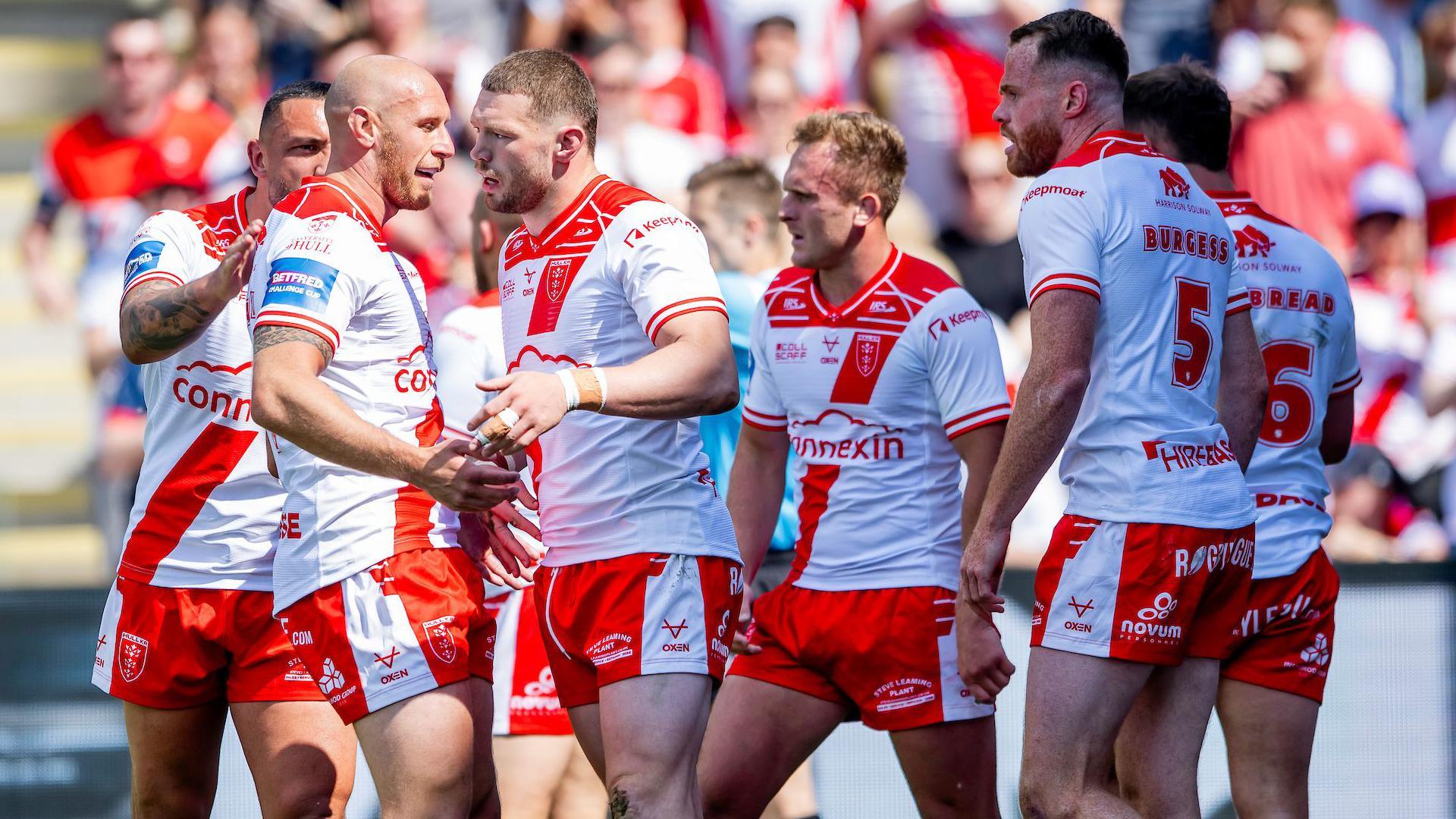 James Batchelor is embraced by a large number of his Hull KR teammates following a try in the Challenge Cup semi-final against Catalans