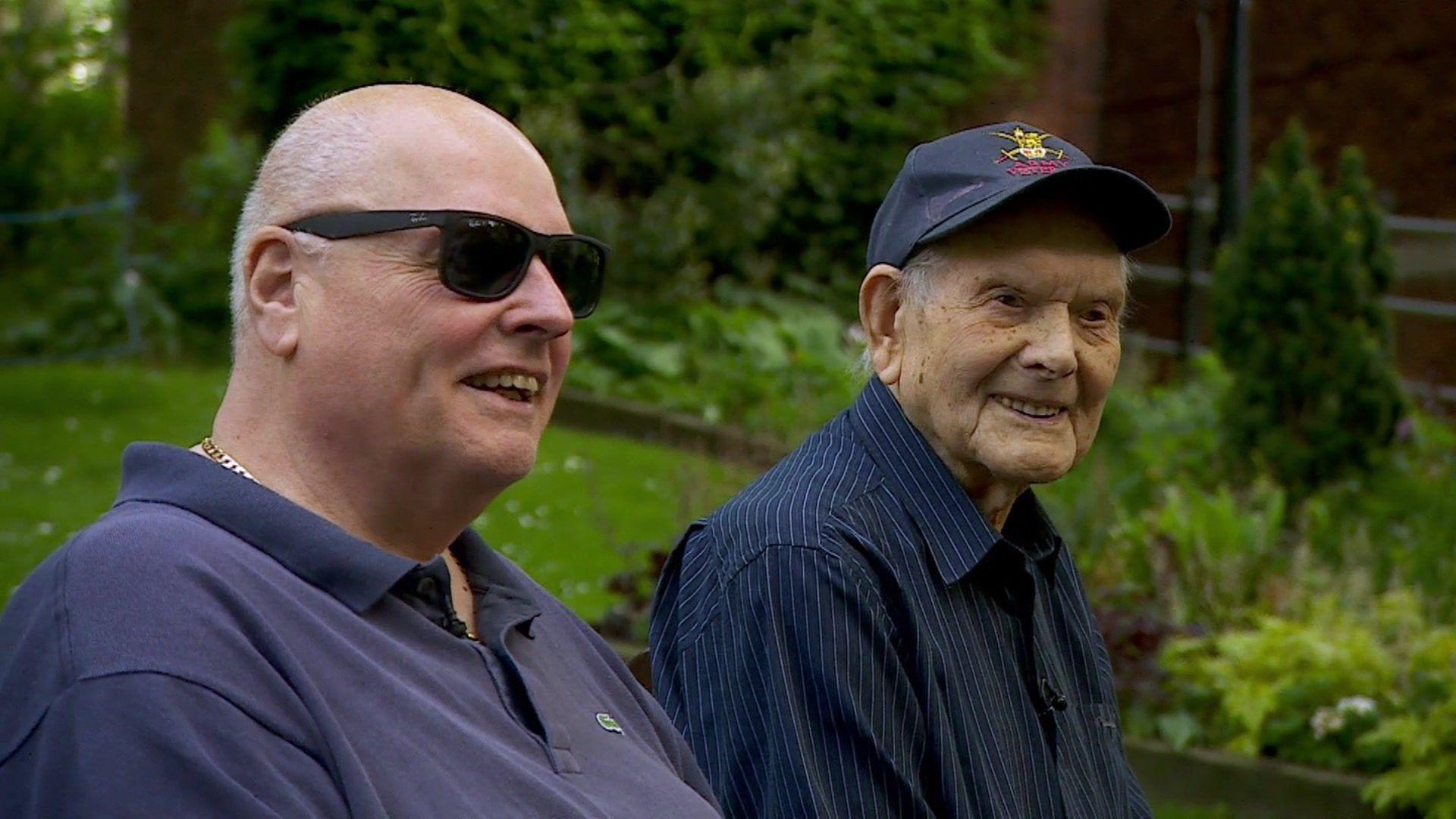 Tony Chafer and Percy Chafer sit looking at the reporter in a park