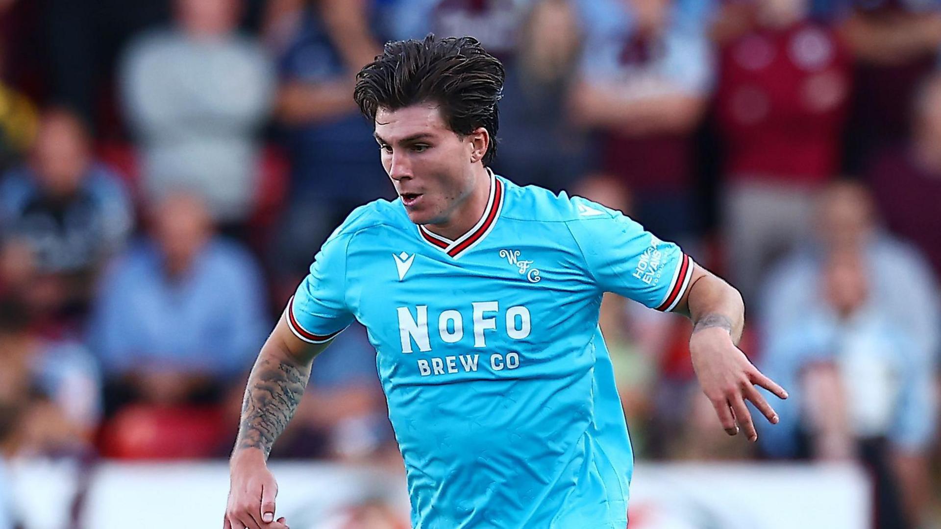 Mason Hancock playing in pre-season friendly against Aston Villa