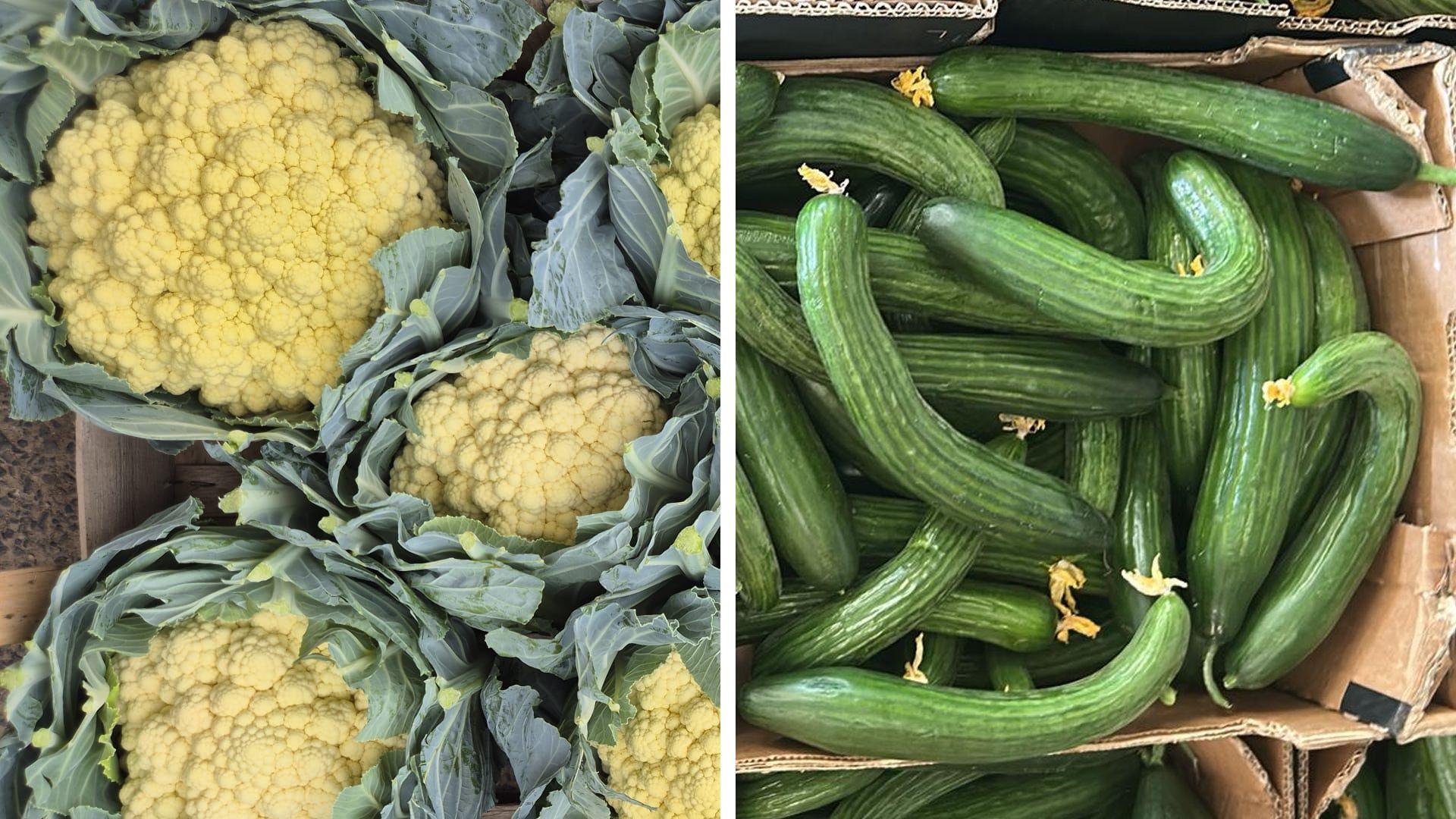 On the left, yellow cauliflower heads, and on the right, bent cucumbers.