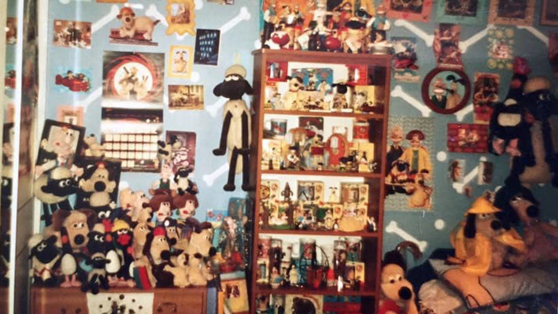 A dated photograph of Ms Harrison's bedroom as a child. It is covered with posters, teddy bears and all sorts of other Wallace and Gromit memorabilia.