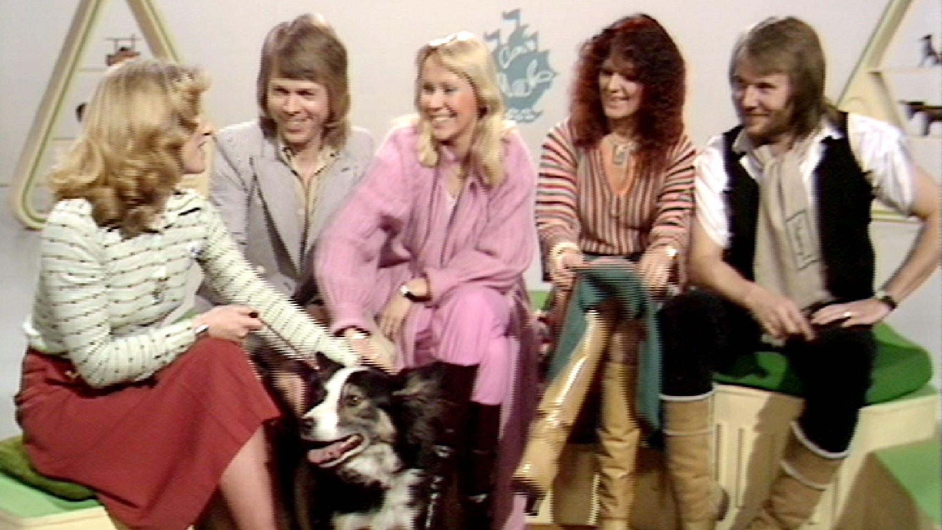 Blue Peter presenter Lesley Judd with the members of ABBA and Shep the Blue Peter dog.