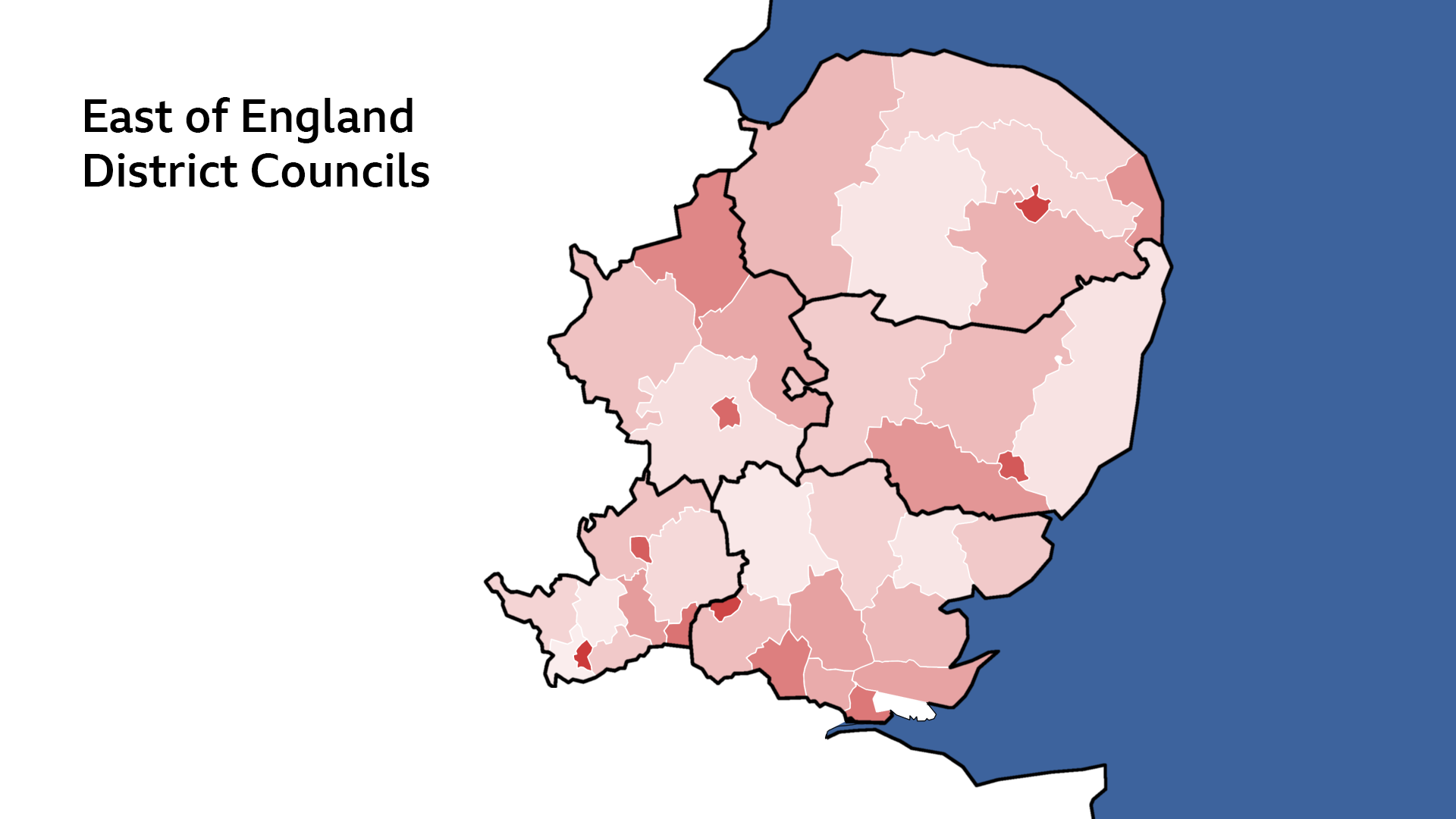 A map of the East of England showing Cambridgeshire, Essex, Hertfordshire, Norfolk and Suffolk, with their district council areas marked in shades of red.