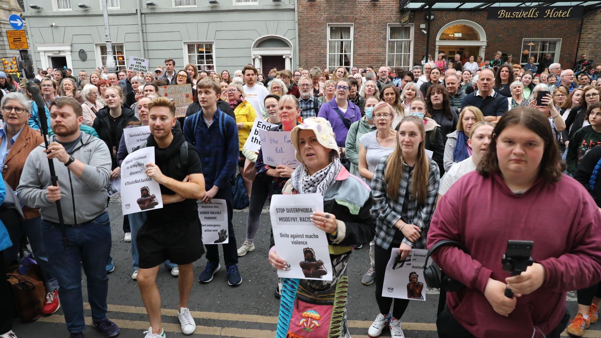 Protesters gather outside Leinster House in Dublin, in solidarity with Natasha O'Brien who was attacked by Cathal Crotty