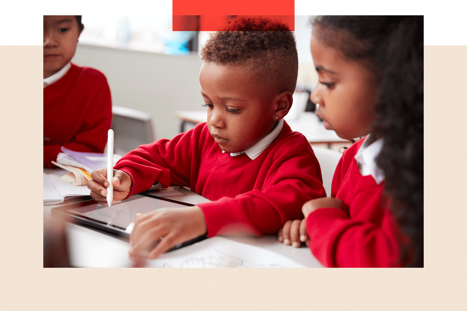 Primary school children working on a tablet