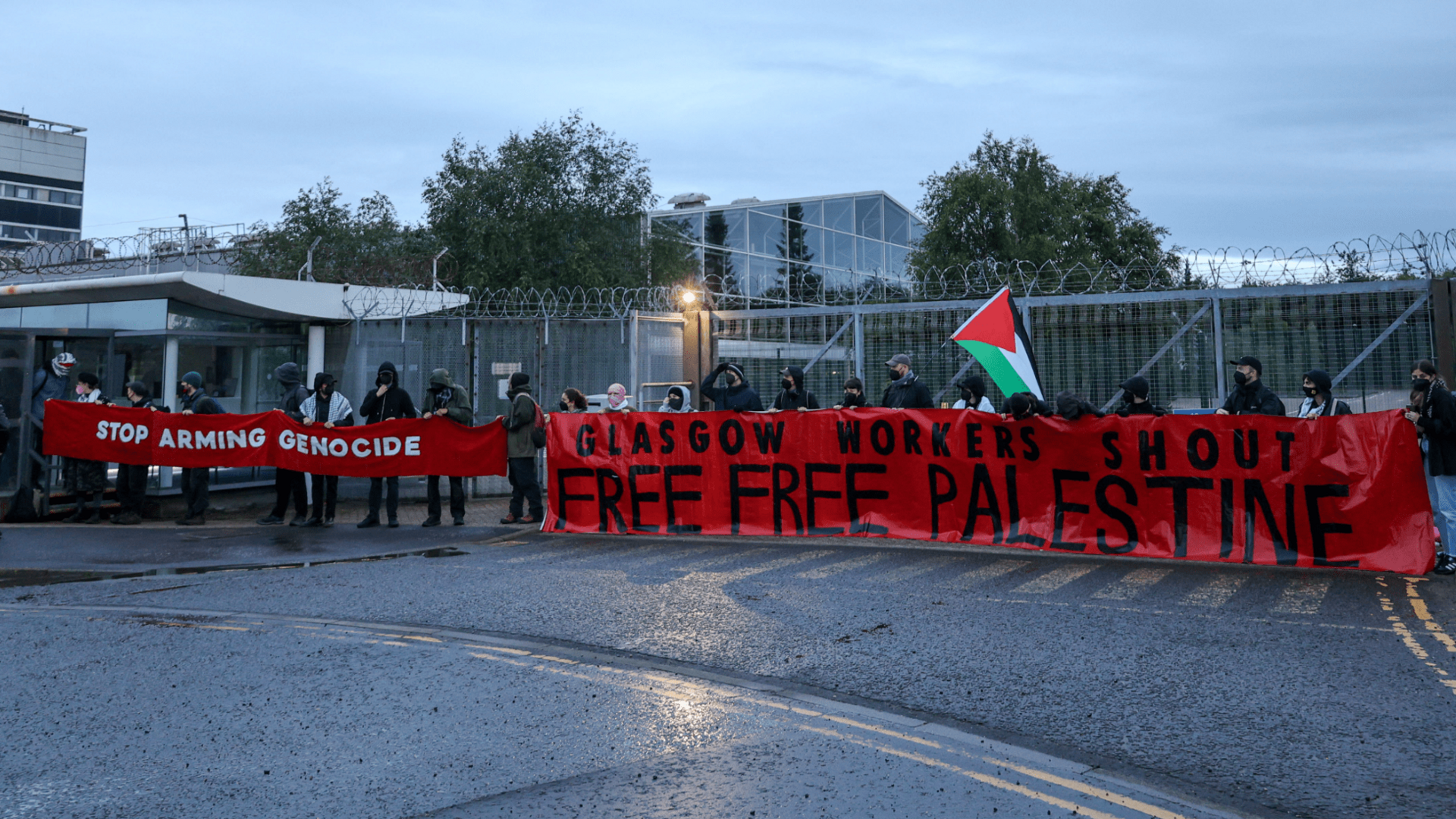 Protesters outside the Thales plant