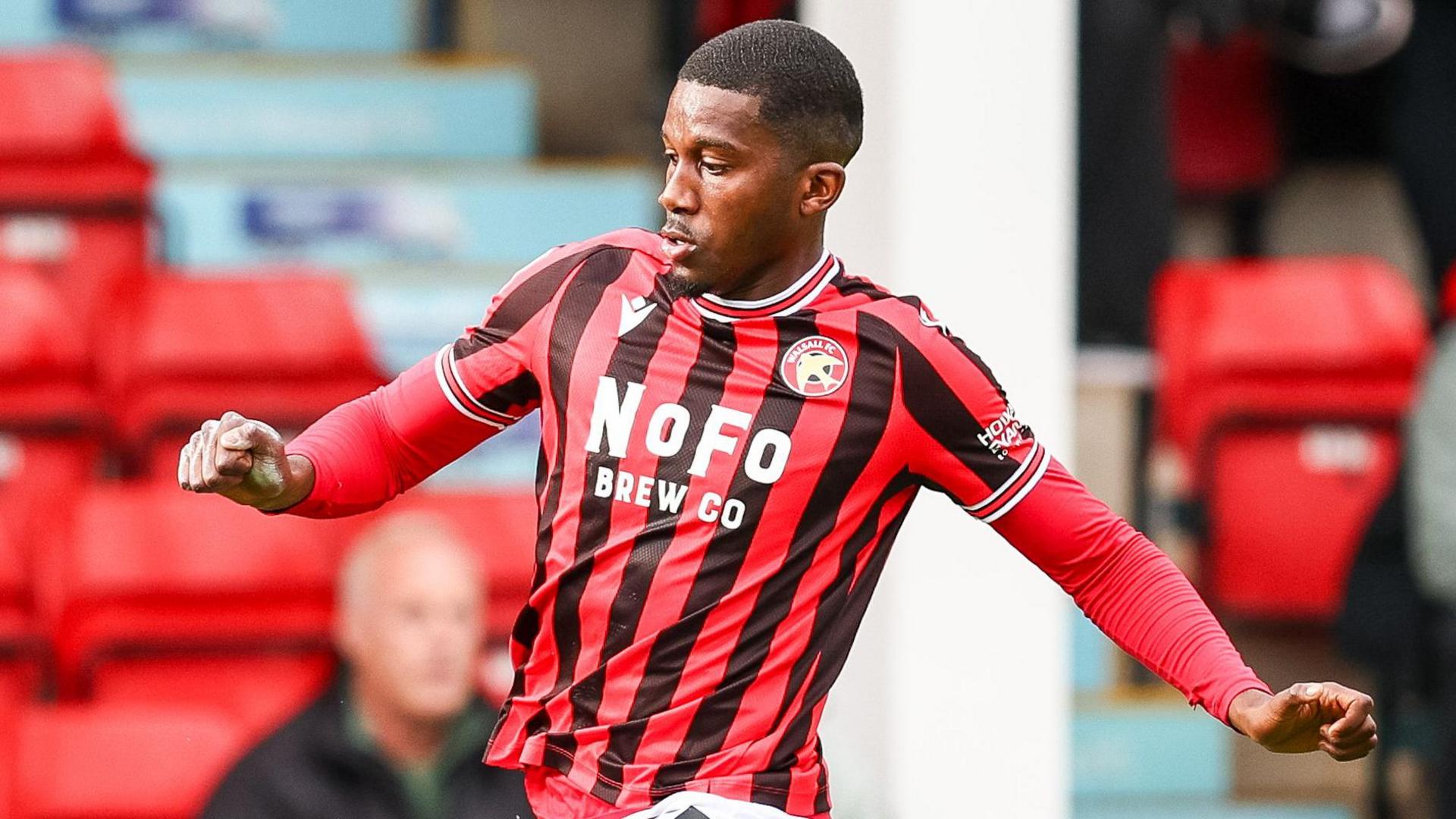 Daniel Kanu in action for Walsall