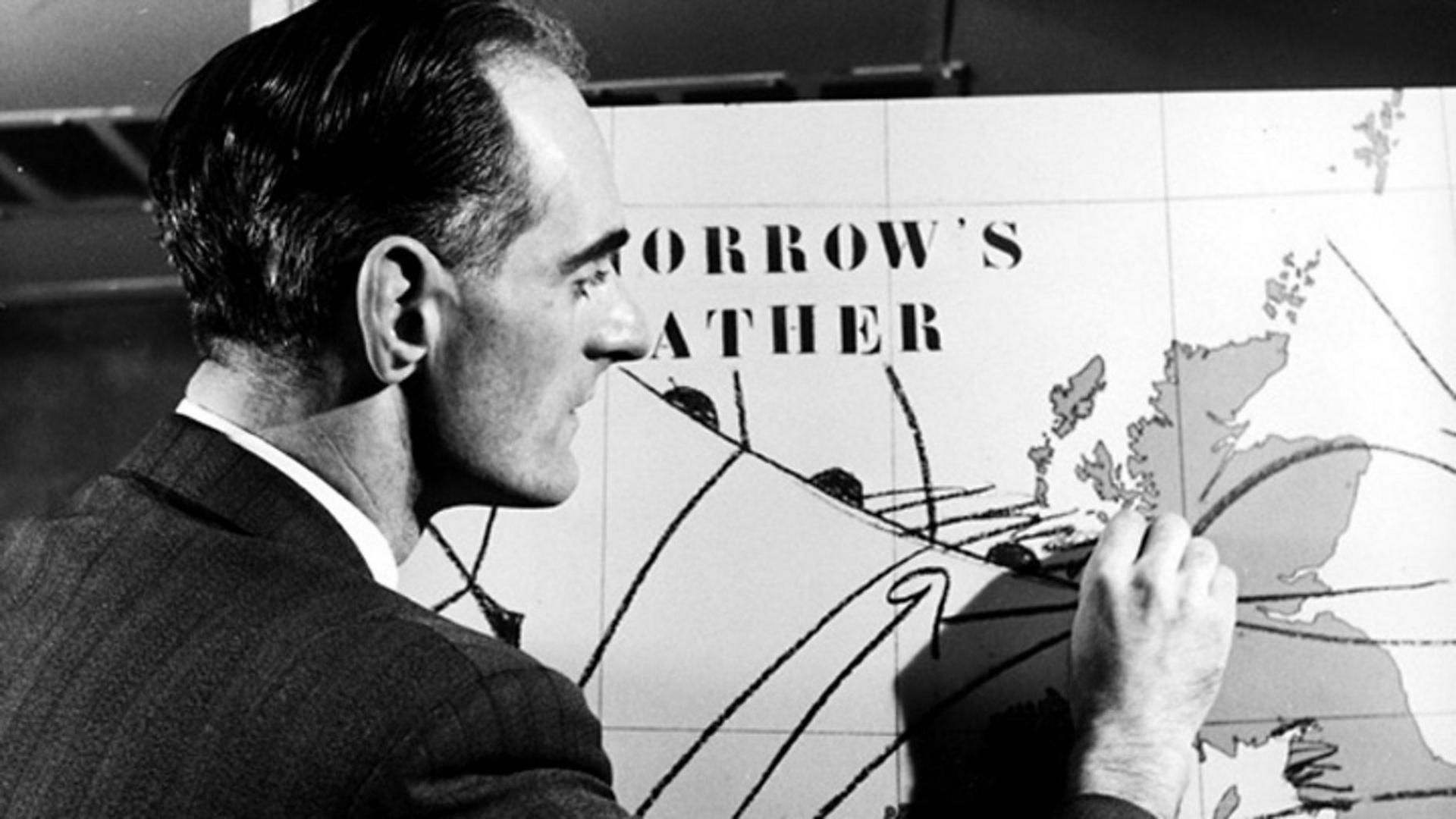 Forecaster George Cowling drawing a weather map by hand for TV in 1954.