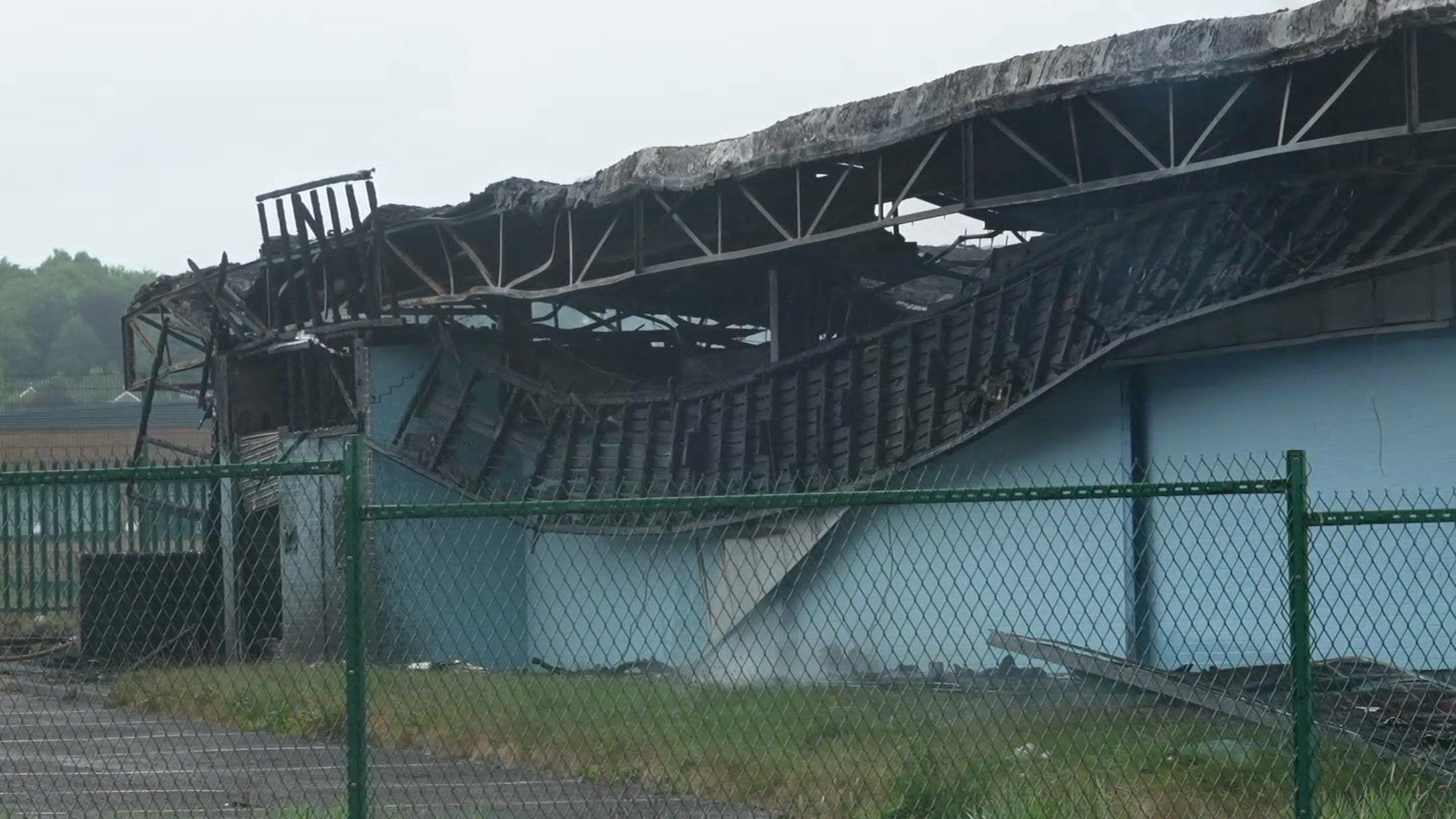 Blackened roof after fire on a single storey building